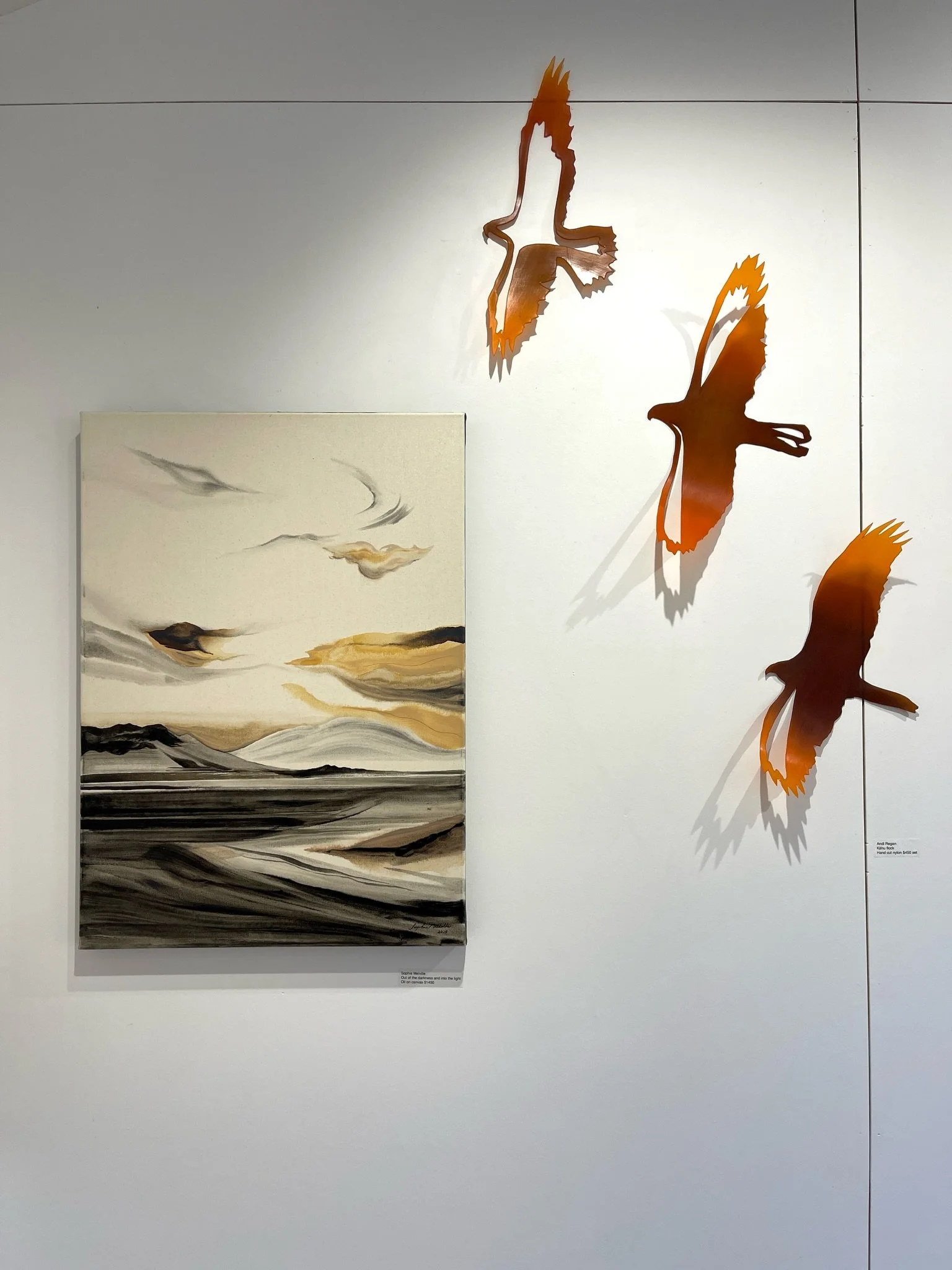 Sophie Melville&rsquo;s &lsquo;Out of the darkness and into the light&rsquo; alongside Andi Regan&rsquo;s &lsquo;Kahu Flock&rsquo;, an ethereal art pairing 🧡