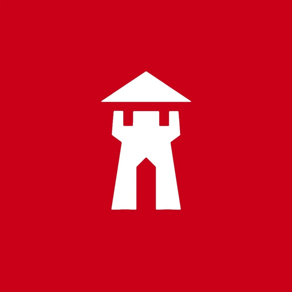 A white silhouette of a castle tower with a triangular roof on a red background.