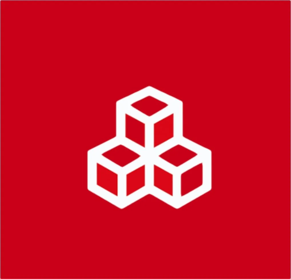 A white geometric icon of three building blocks on a red background.