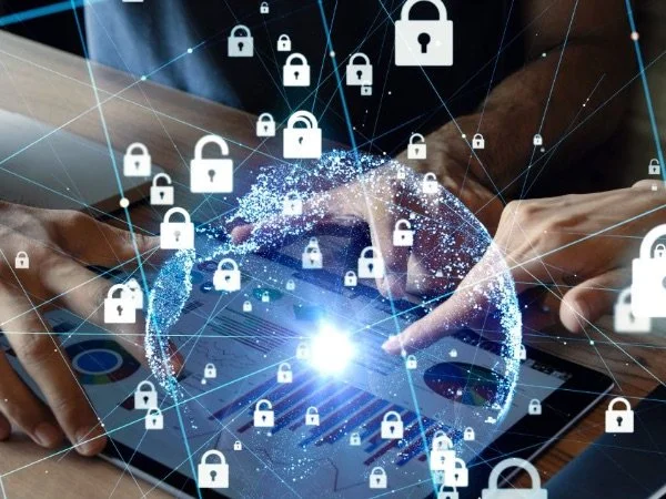 Hands interacting with a digital globe surrounded by padlock icons, representing cybersecurity or data protection.