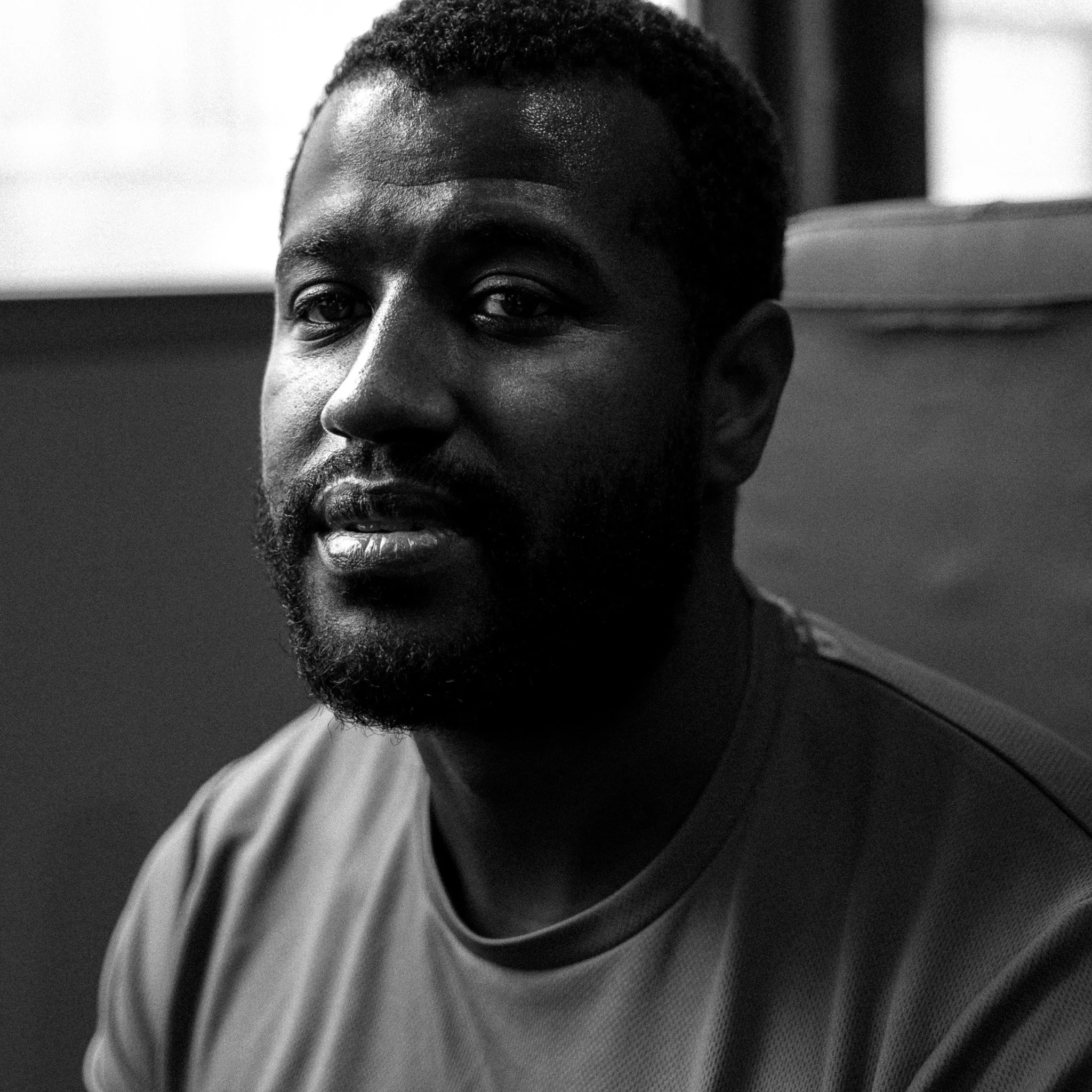 Cinematic editorial portrait photography, black & white