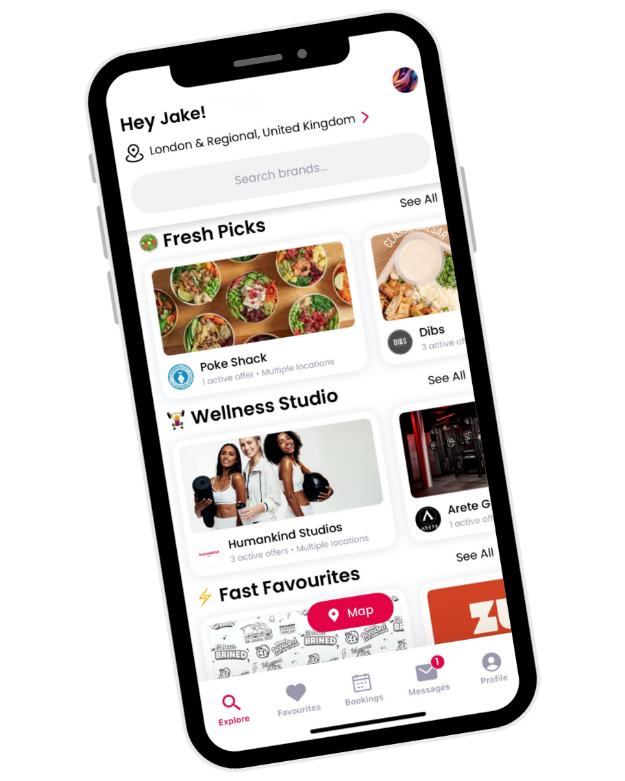 Smartphone displaying a mobile app interface with sections for local offers, wellness studio, and fast favorites, set in the London & Regional, United Kingdom area.