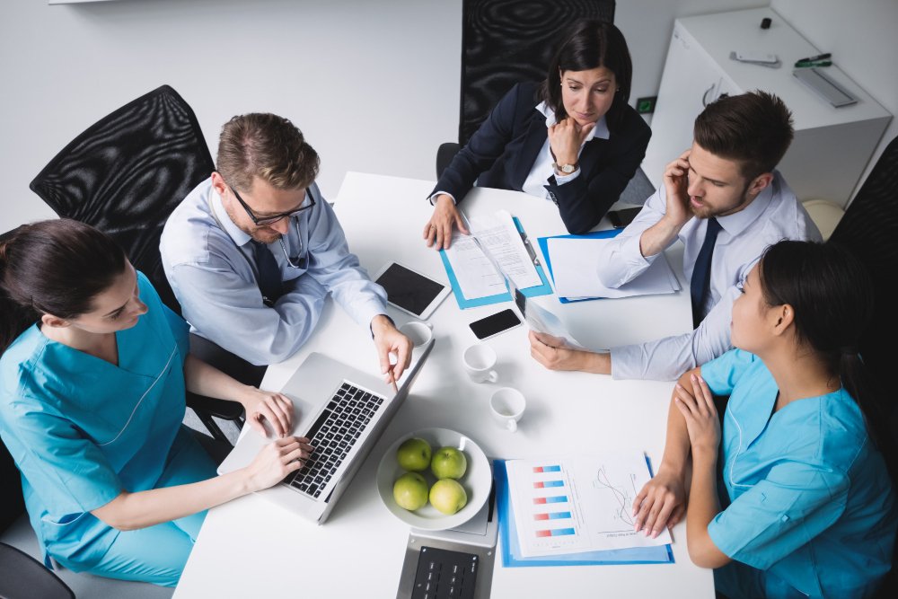 group of girls and men talking