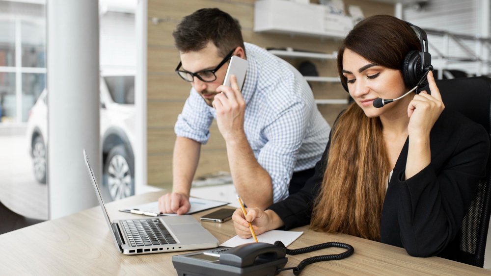 Girl and men seeing on laptop