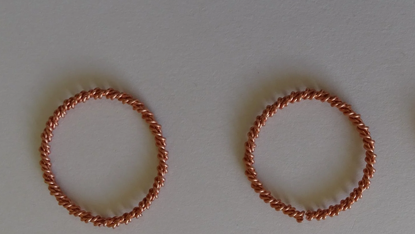 A pair of Copper Quad-Wire, Double-Tensored Rings.