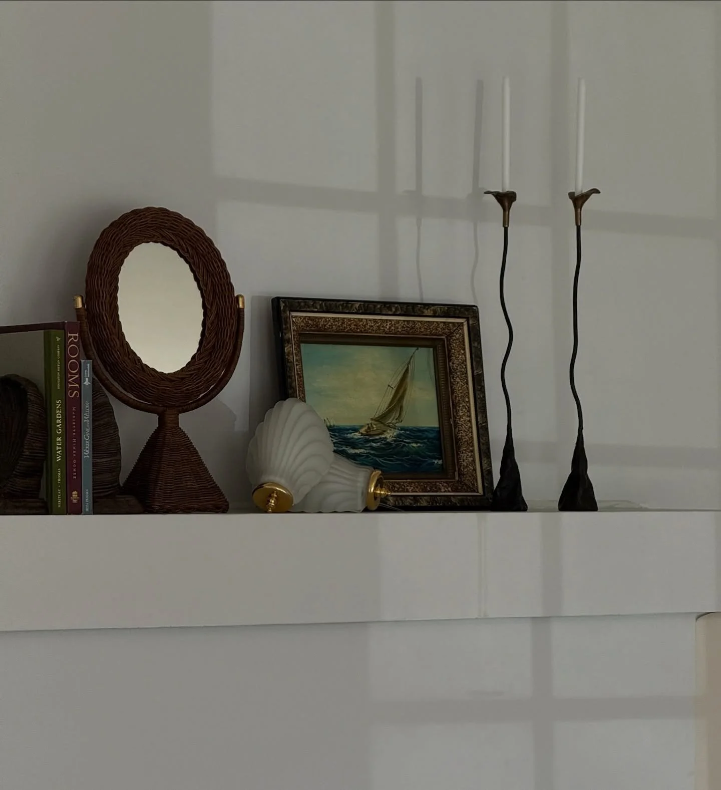 A few treasures from The Riviera Edit still available🐚✨
The Jardin Stem Calla Lily candle holders, the mid-century C&ocirc;te sconces in frosted Swedish glass, and the Coquille bookends, sculptural shells that hold stories of the sea.🌊

Shop what r