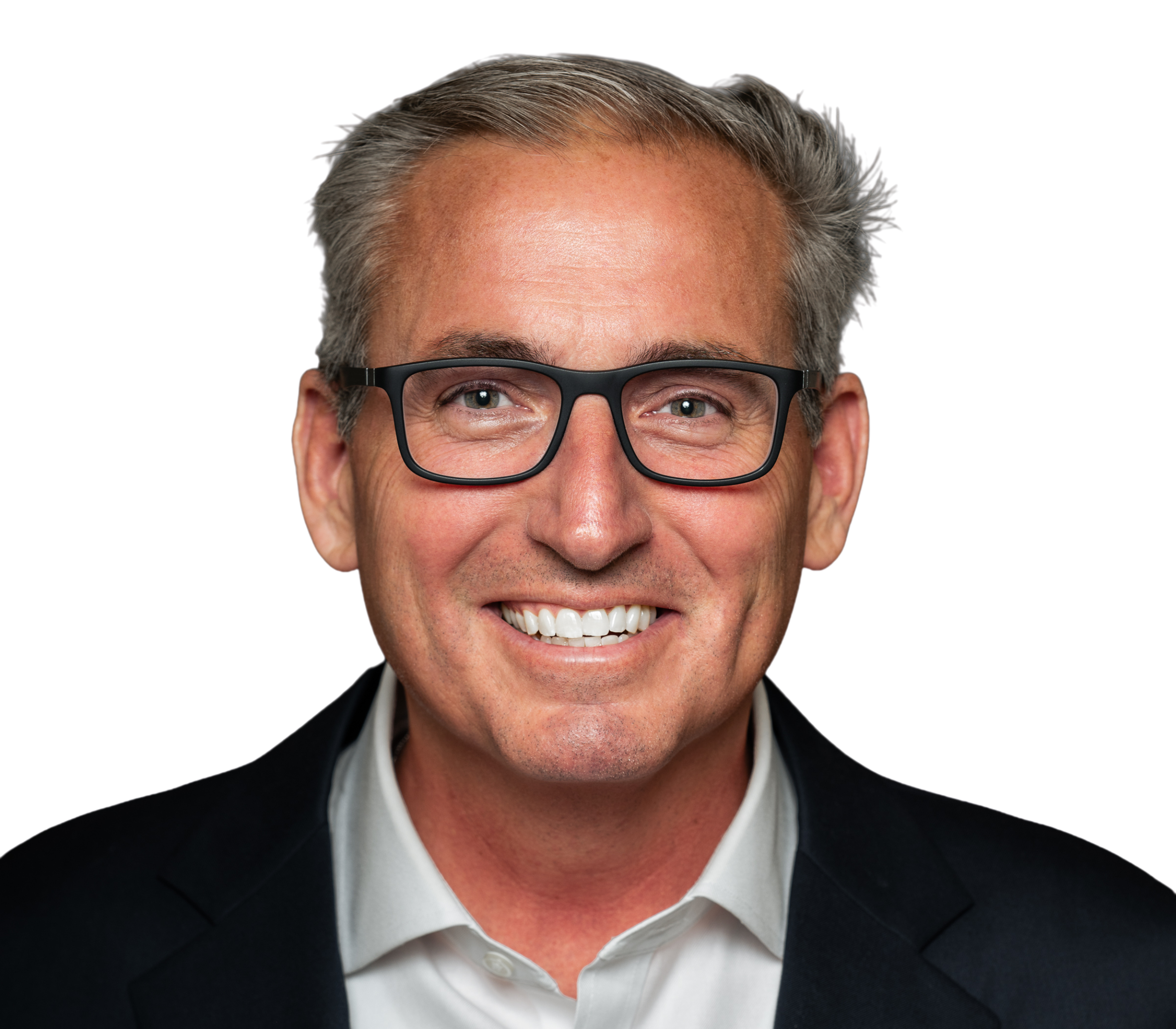 A professional headshot of a middle-aged man with gray hair and glasses, wearing a dark gray checked suit and a light pink shirt, smiling slightly against a white background.