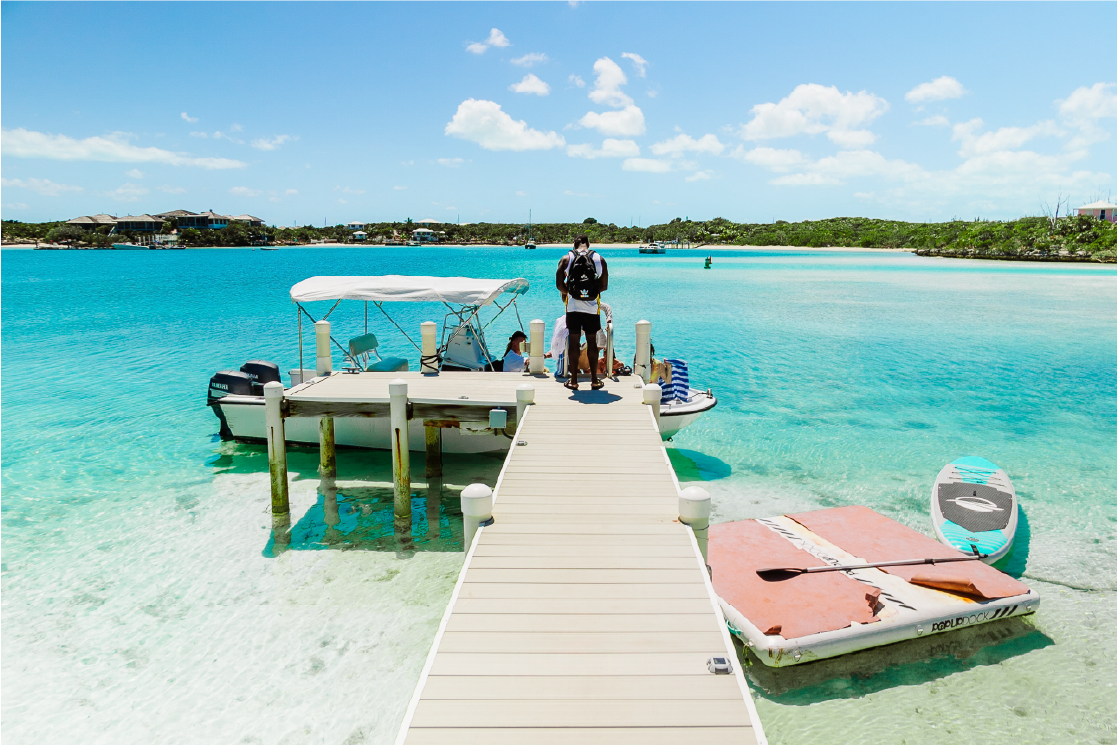 guests boarding a boat off the private dock