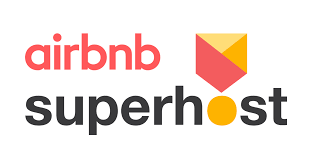Airbnb and Superhost logos with a red Airbnb logo and a superhost logo in black text.