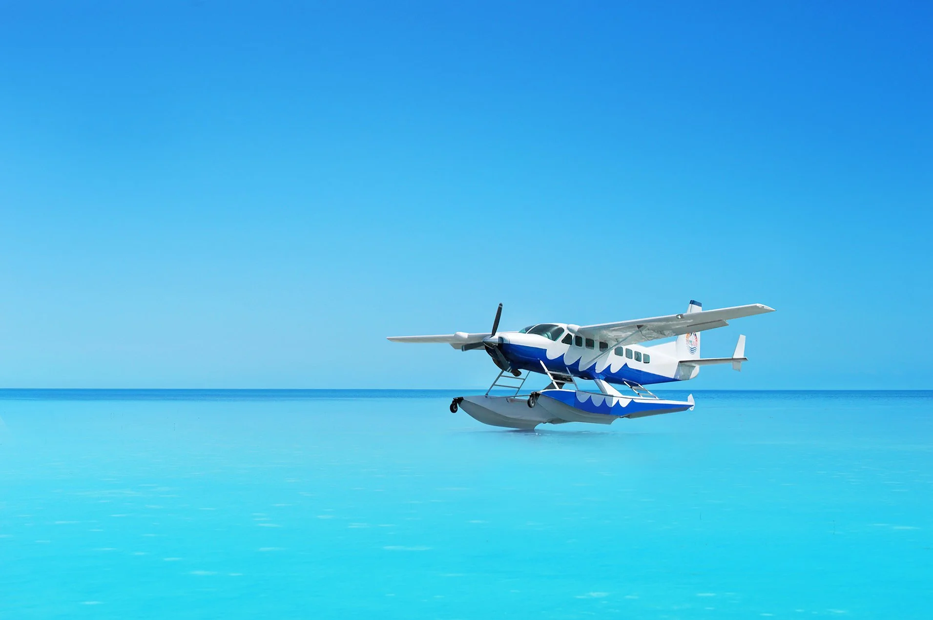 Seaplane landing in the waters in the Bahamas