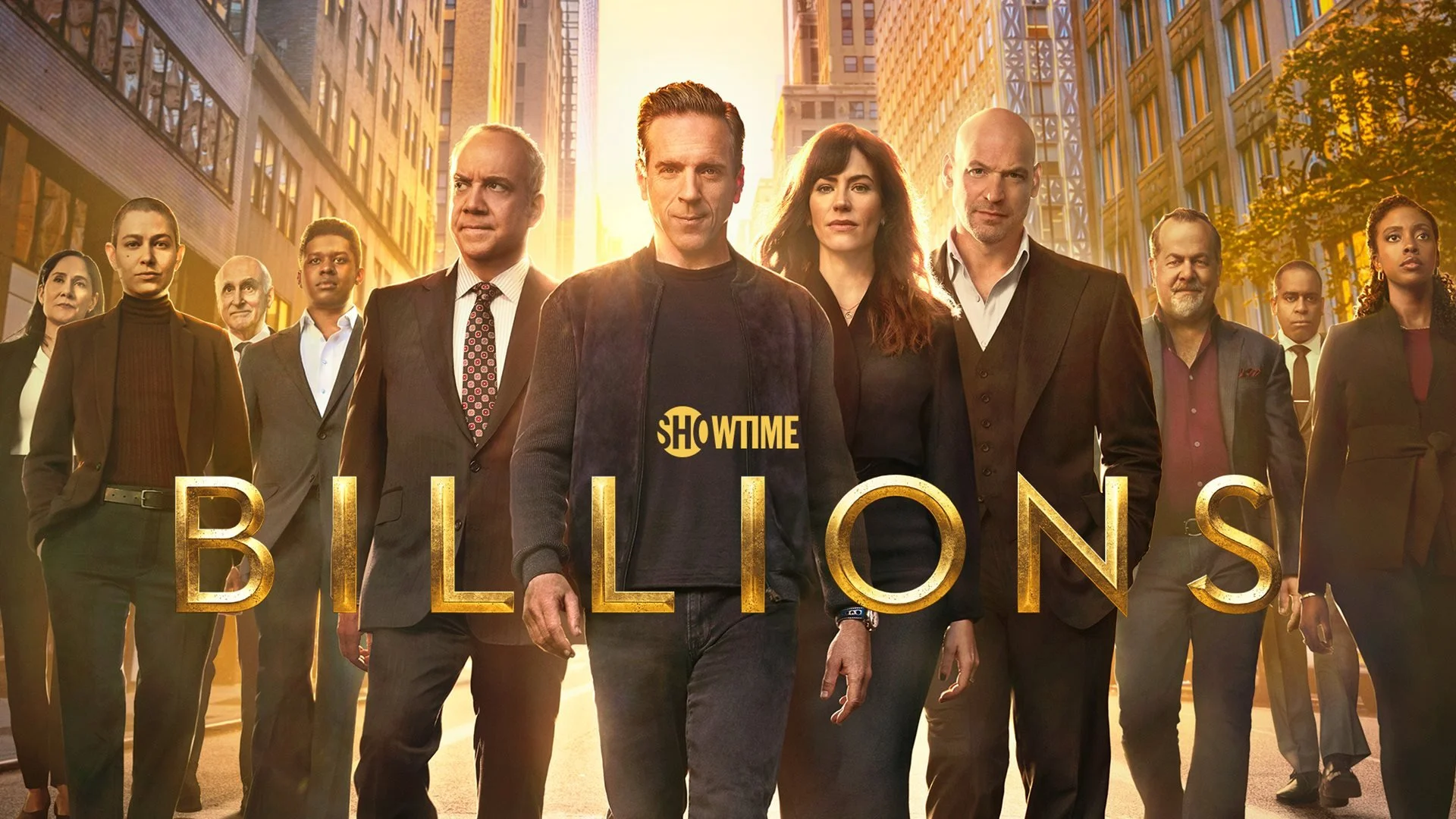 Cast of the TV series 'Billions' walking down a city street at sunset.