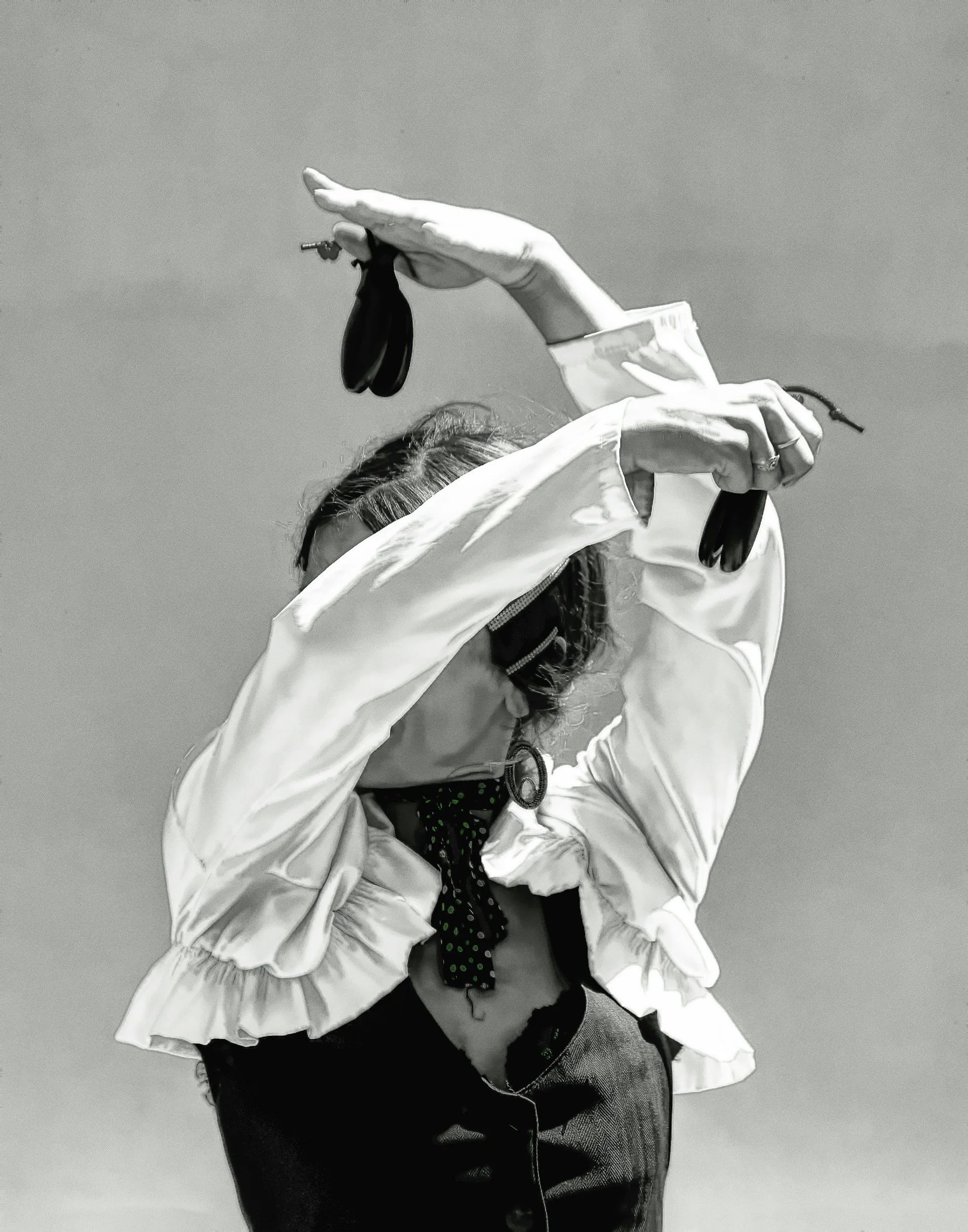 Black and white photo of a female Spanish Flamenco dancer in Andalusia.