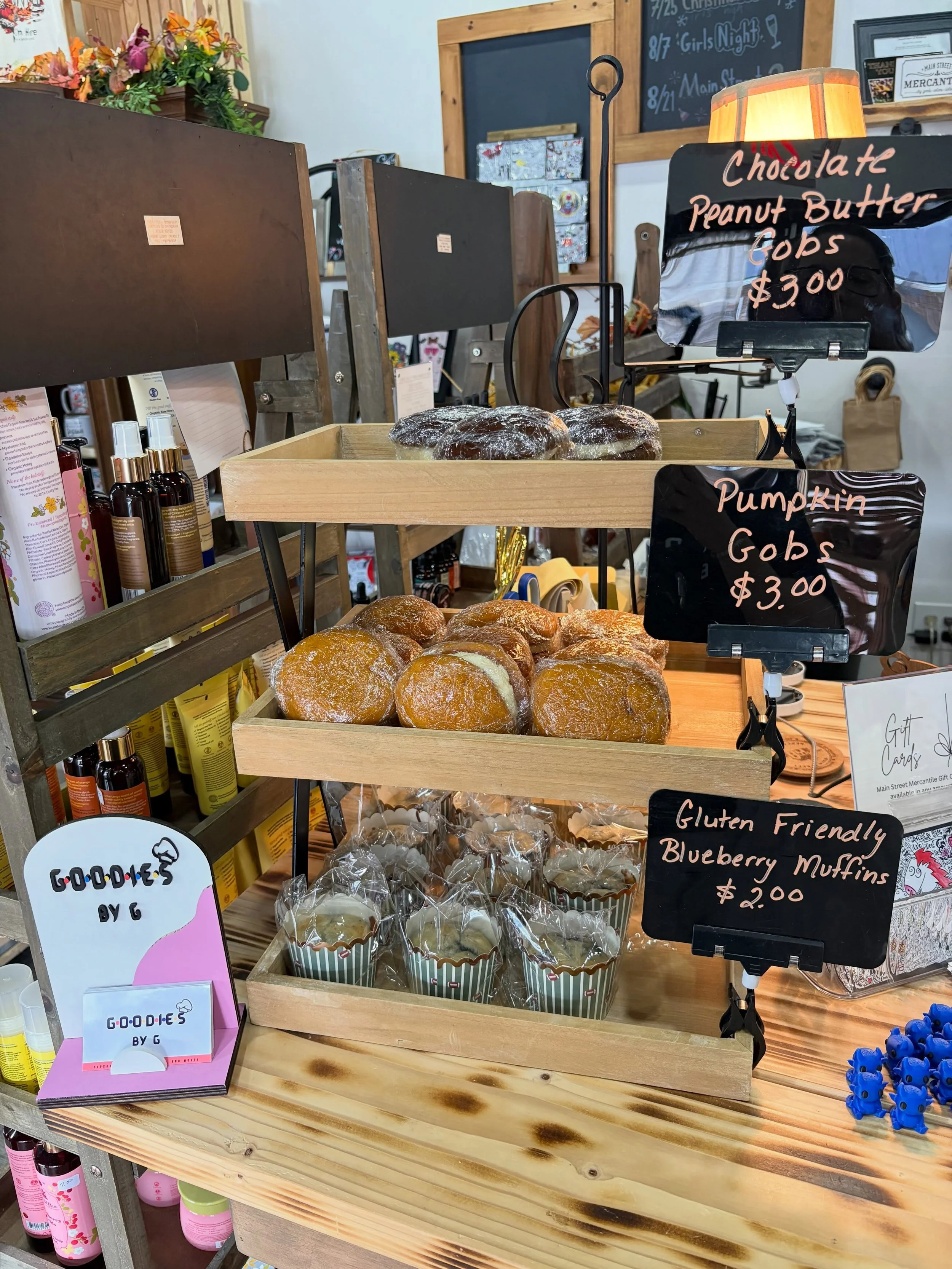 We just restocked our goodies @mainstreetmercantileba for the week! Stop in and grab a treat!🧡🤍