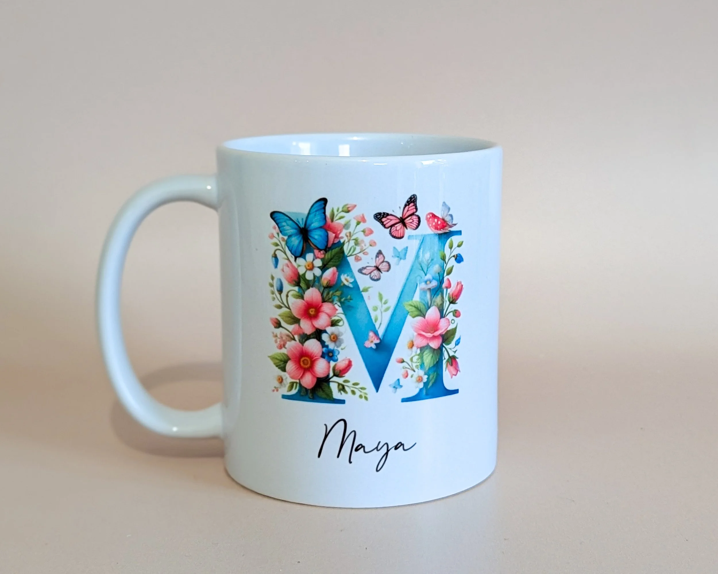11oz white ceramic mug with floral initial letter and name