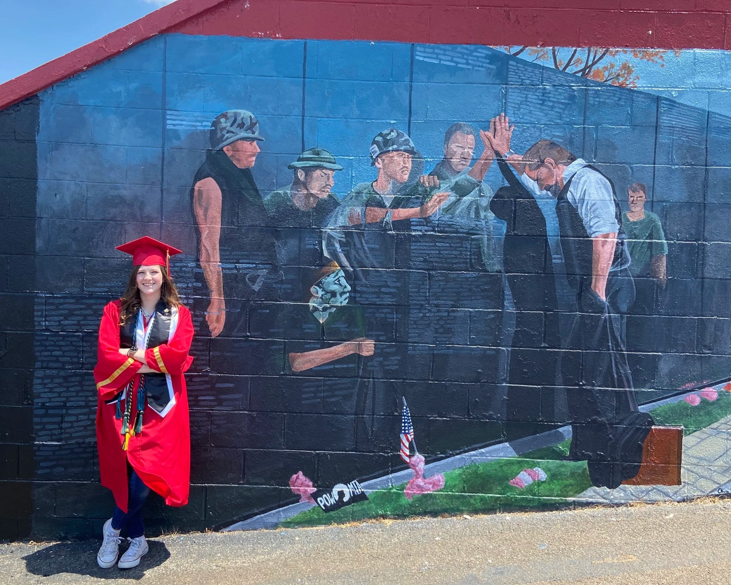 "Reflections" by Lee Teter Repainting 
10 x 22' Acrylic Mural at Daniel Boone High School (Was torn down in 2023 for remodeling) 