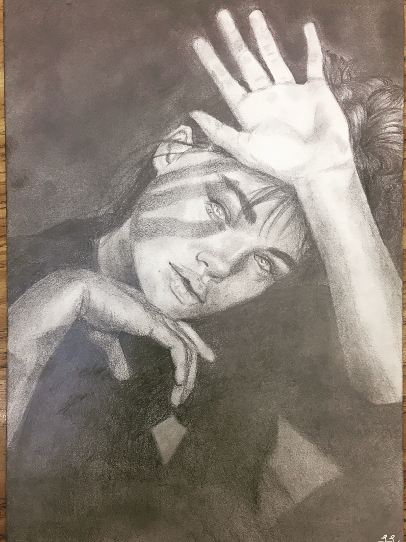 A detailed graphite pencil drawing of a woman with piercing eyes, partially obscuring her face with her hand, and displaying expressive features.
