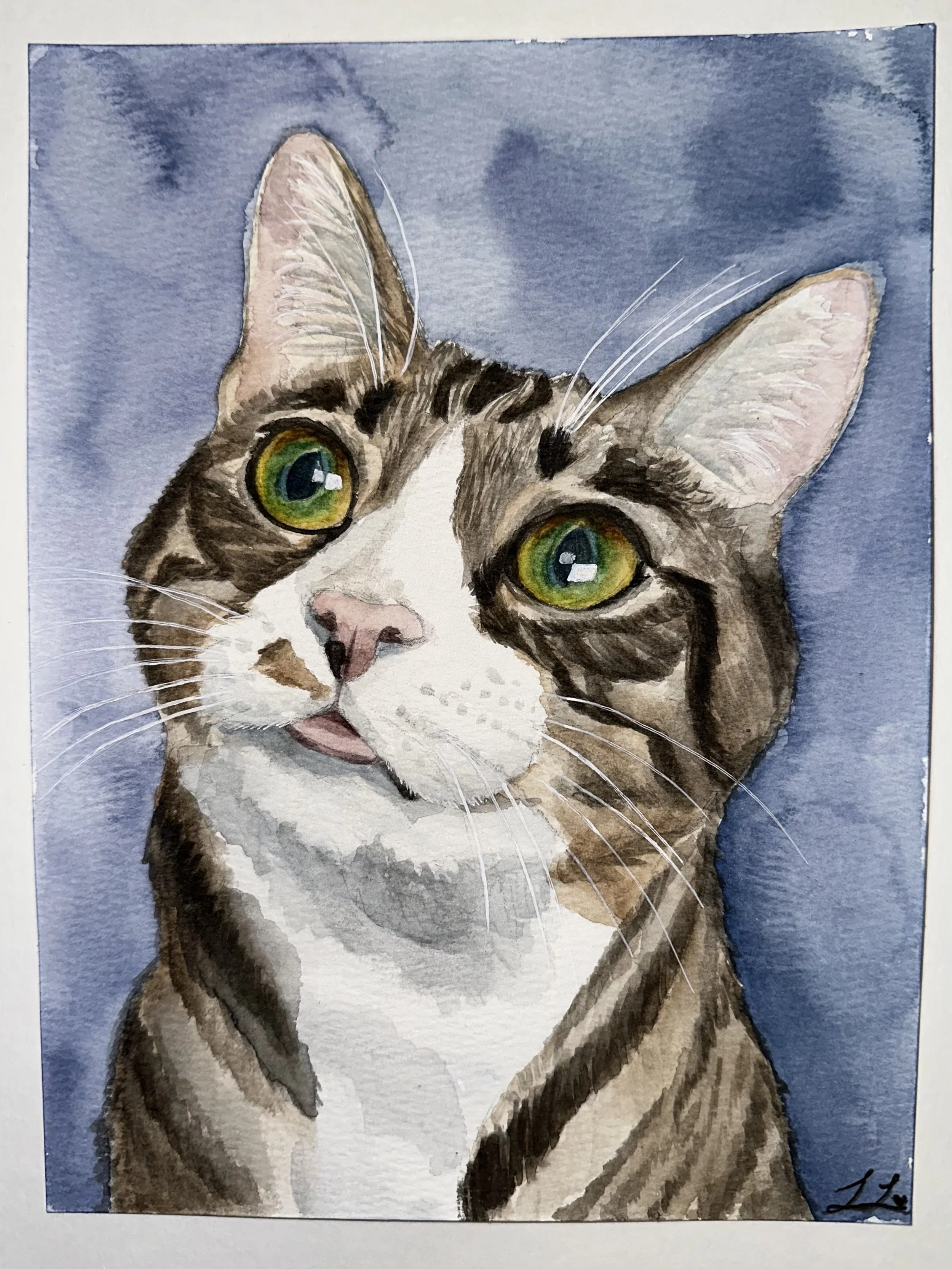 A watercolor painting of a cat with green eyes, short fur with brown, black, and white markings, against a blue background.