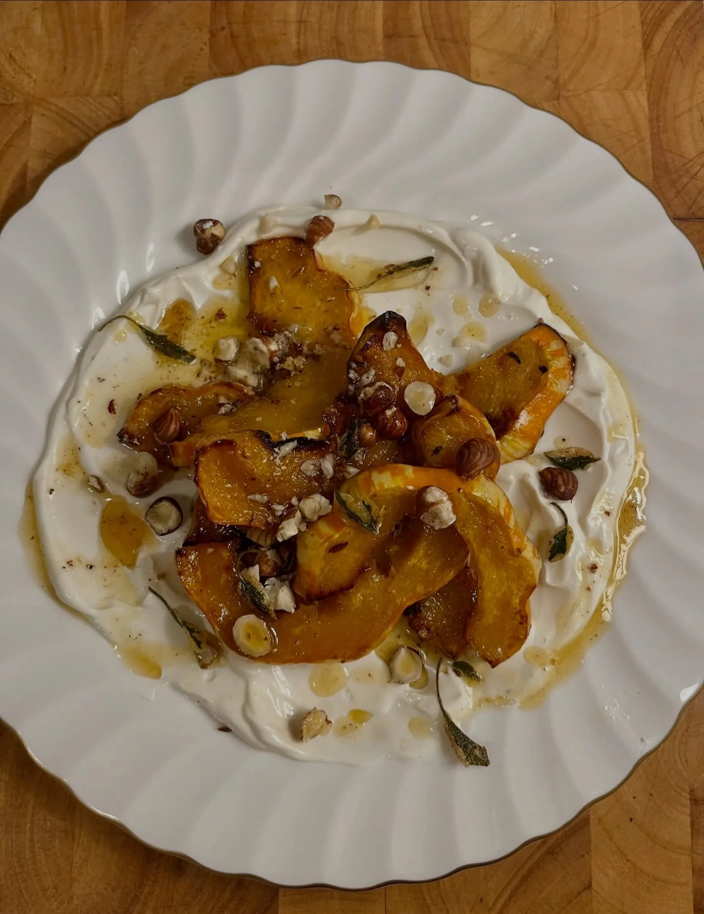Pumpkin tossed in our dark syrup then roasted. Sat atop a generous scoop of labneh, topped with sage browned in butter and hazelnuts. Rich and delicious