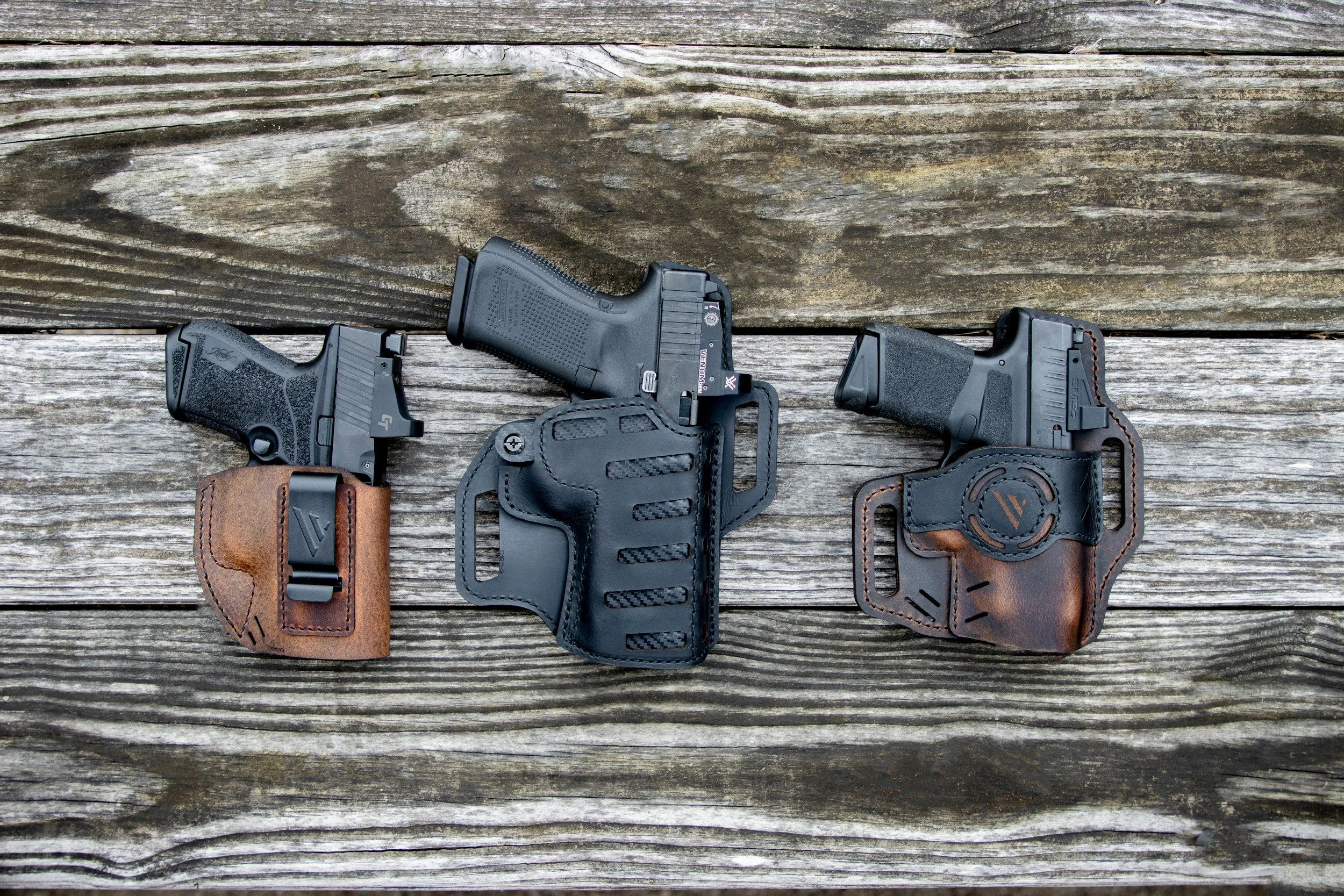 Conceal carry guns laying on table