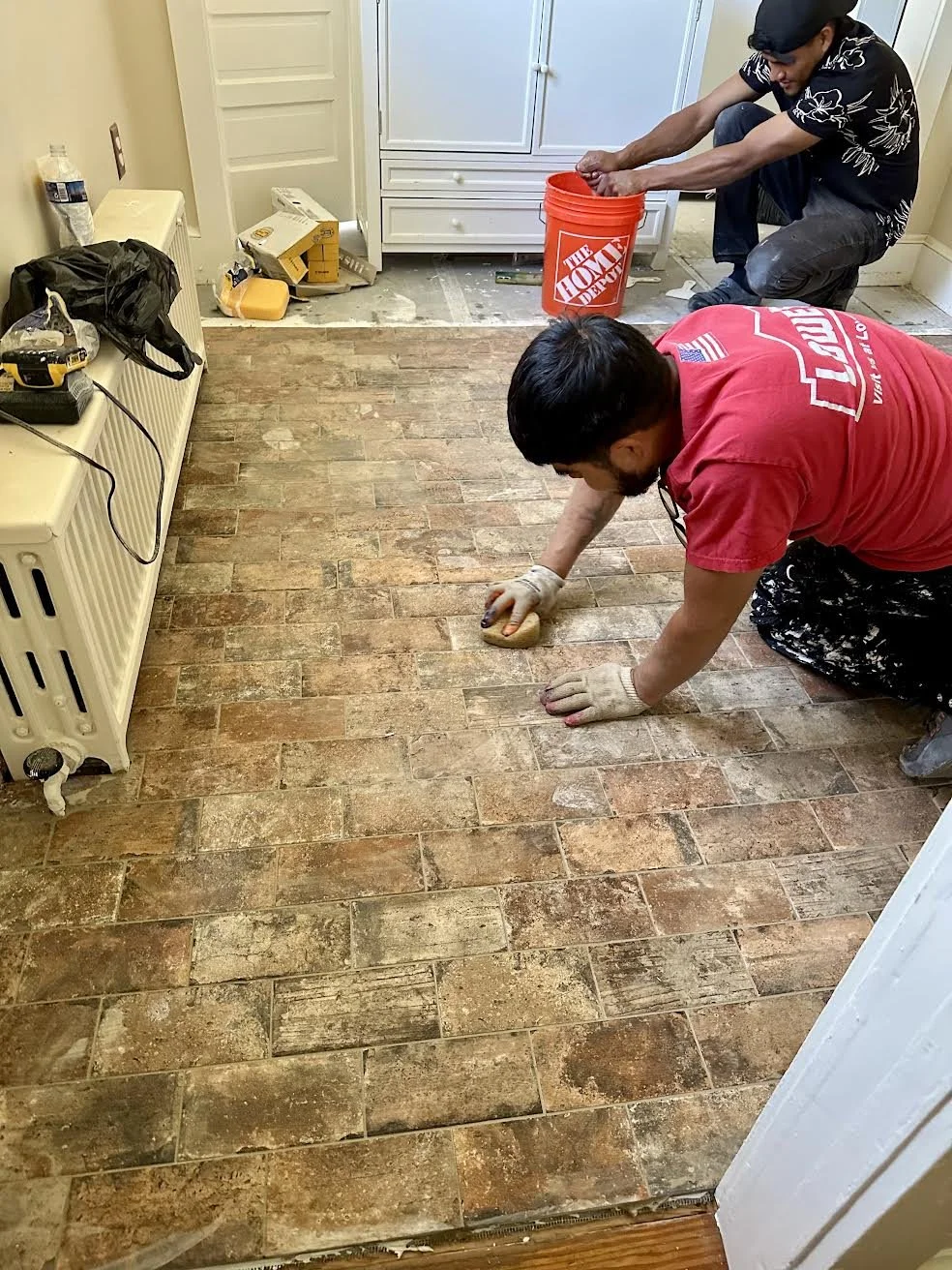 Many sponging grout clean up