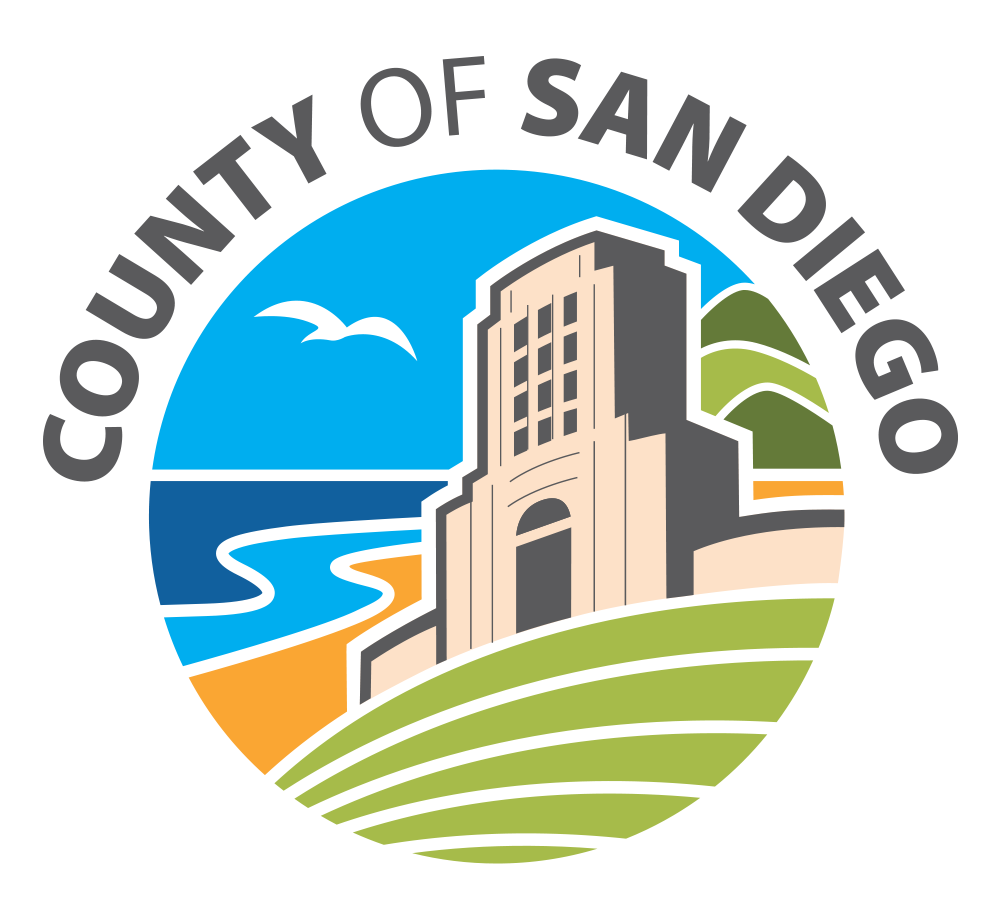 Seal of the County of San Diego featuring a beach scene, a seagull, and rolling green hills.