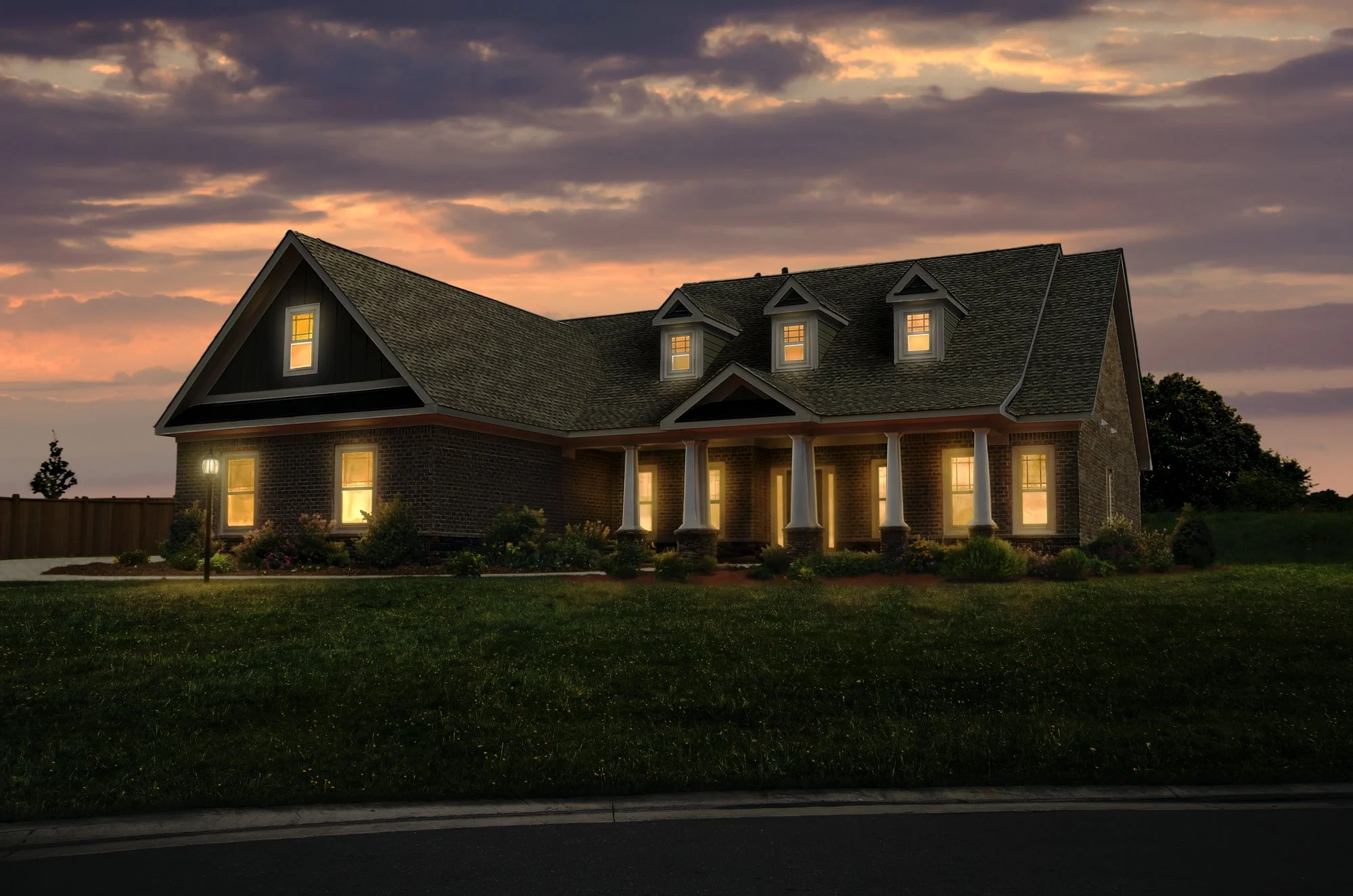 Twilight Exterior | Premium dusk conversion with illuminated windows, warmer color, and a more atmospheric real estate presentation.