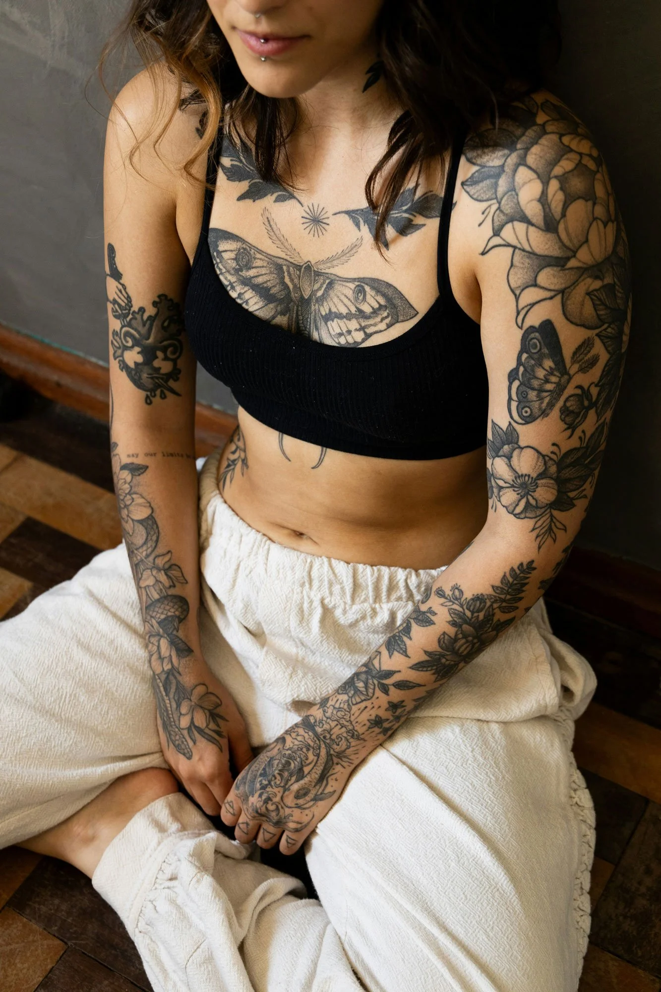 Original Portrait | Source photograph featuring large tattoos across the chest, shoulders, arms, hands, and torso.