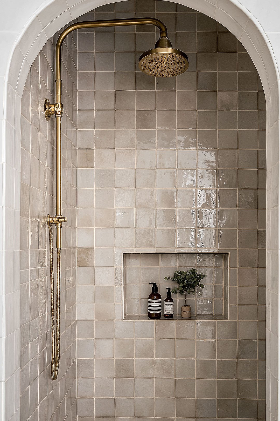 studio-sakaia-bathroom-arched-shower-brass-fixture.jpg