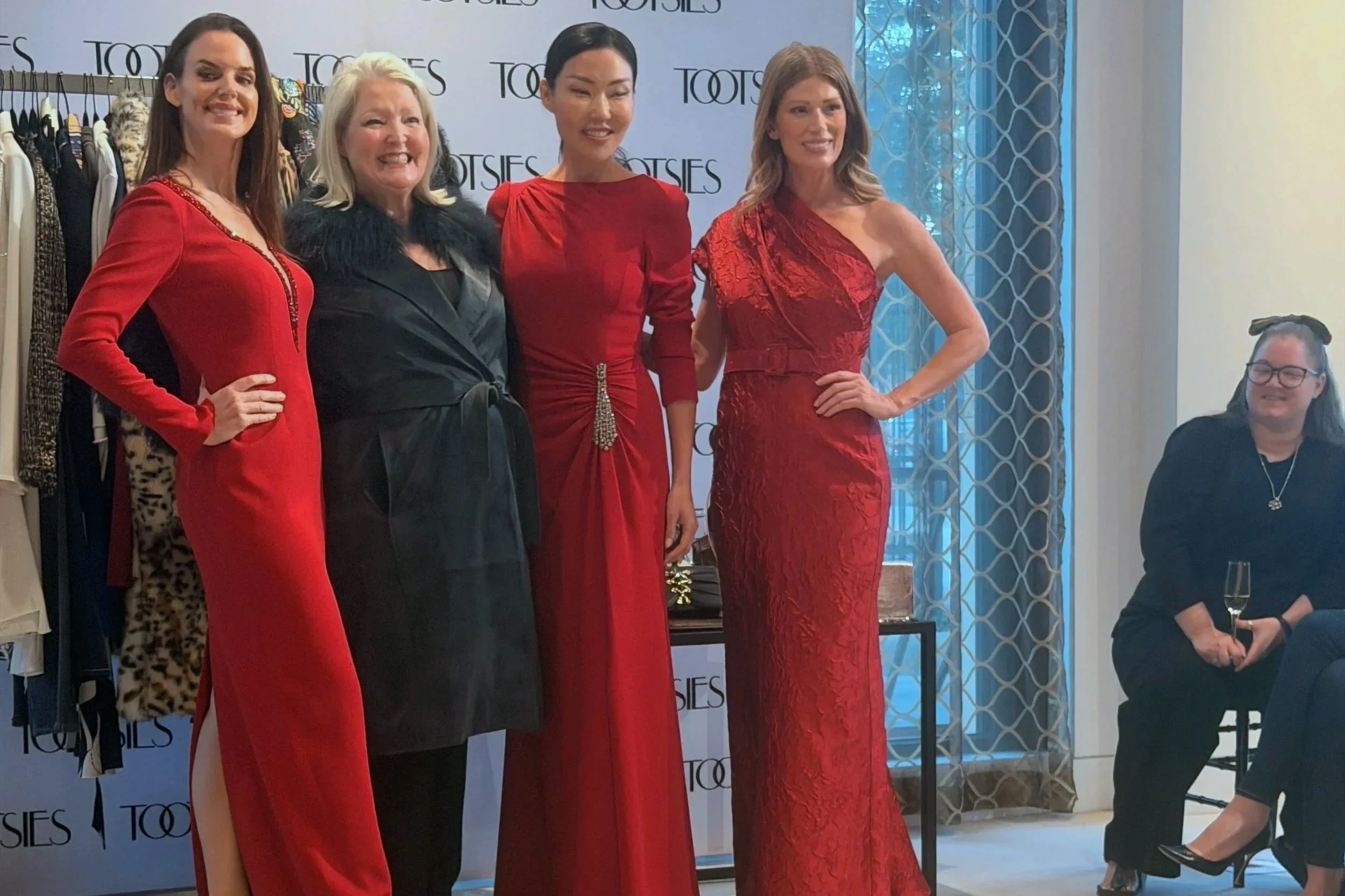 Kelly producing a DAR Fashion Show to raise money for charity.