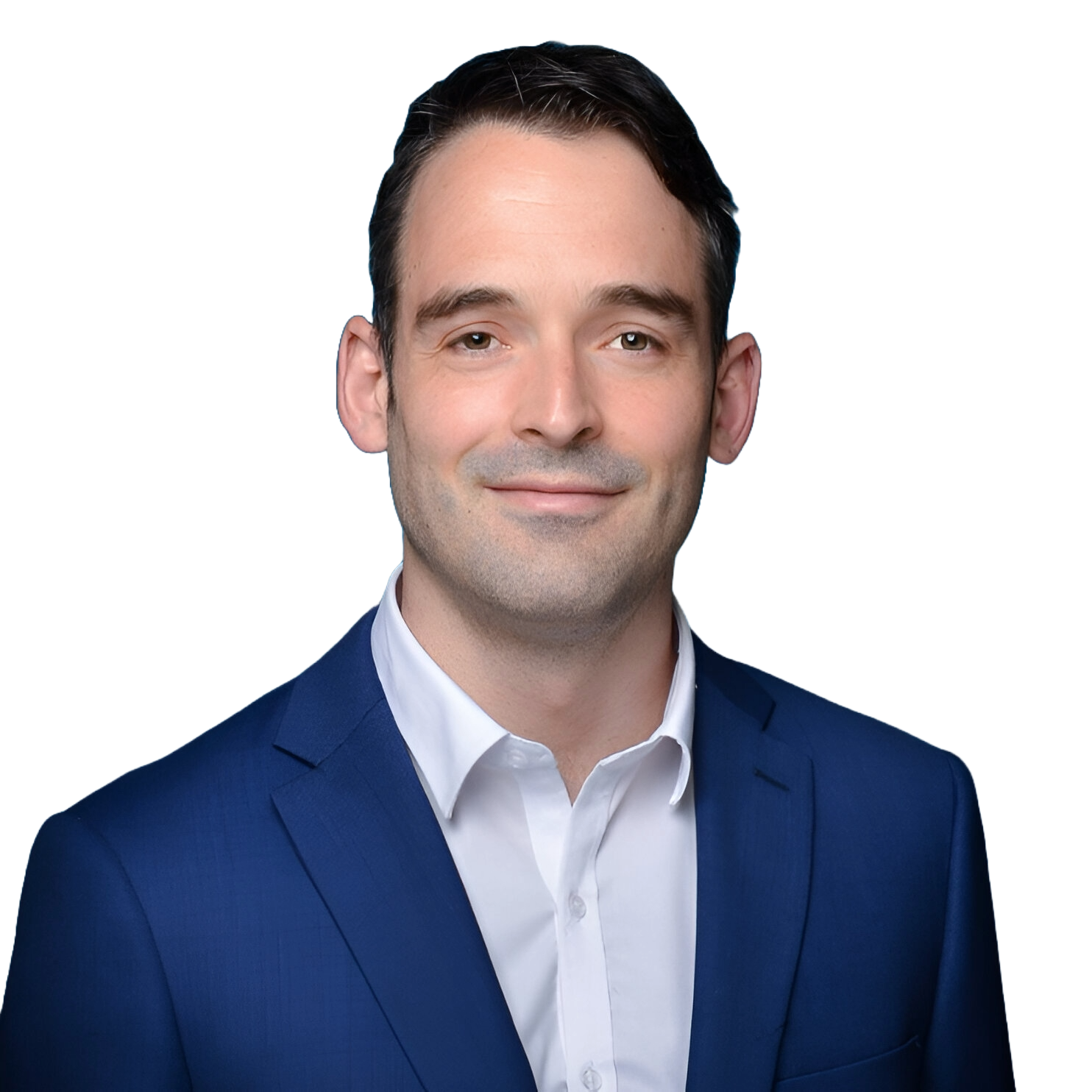 Portrait of a man in a dark blue suit and white shirt, smiling at the camera with a plain dark background.