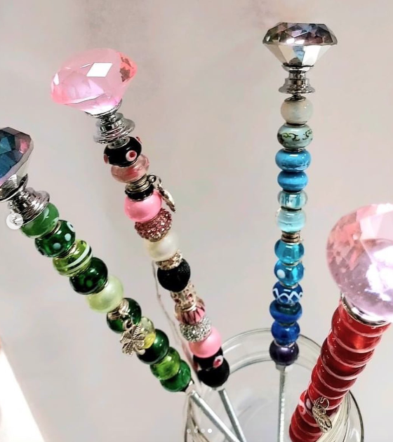 Make Your Own Fairy Wands with colorful beads, charms and crystal toppers