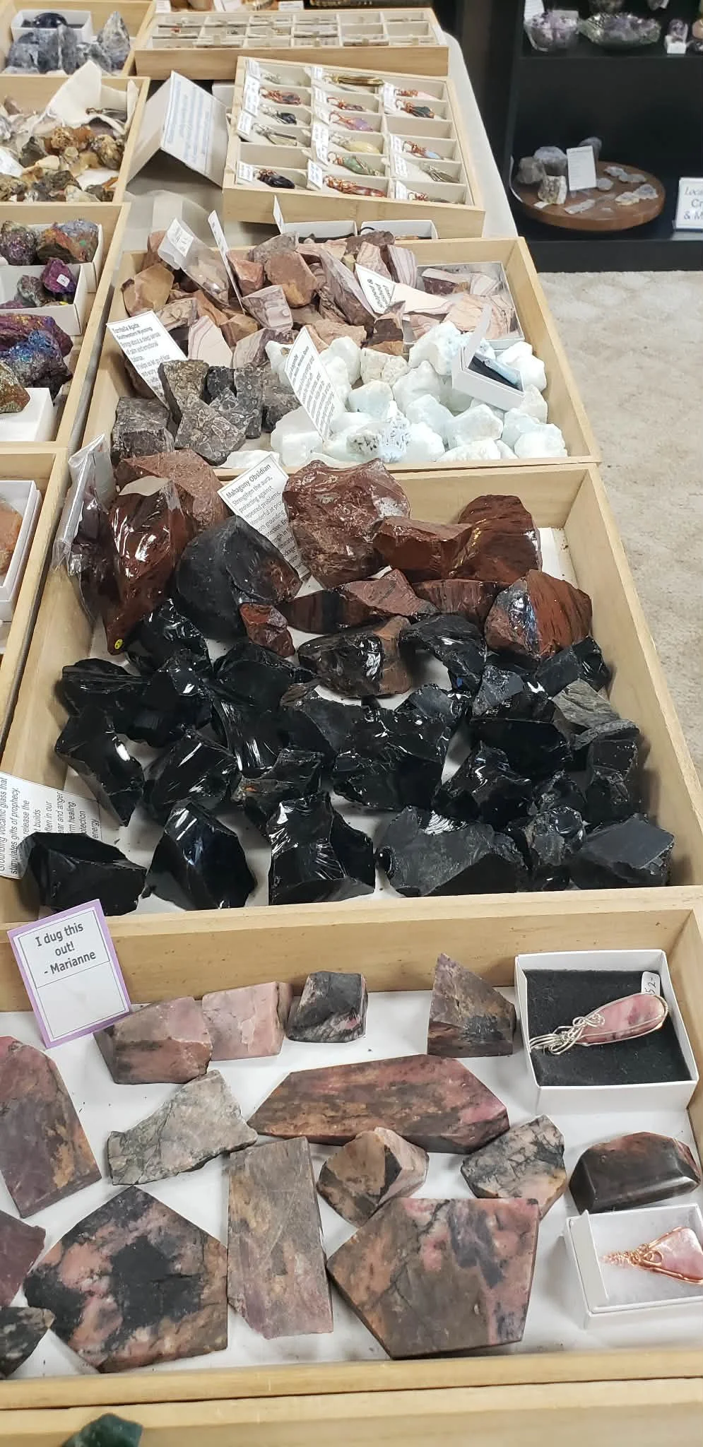 an enormous selection of rough raw crystals minerals geodes tibetan singing bowls jewelry black tourmaline kyanite sodalite green aventurine celestite rhodonite moss tree agate citrine dolomite obsidian mahogany lapis lazuli pegmatite chalcopyrite