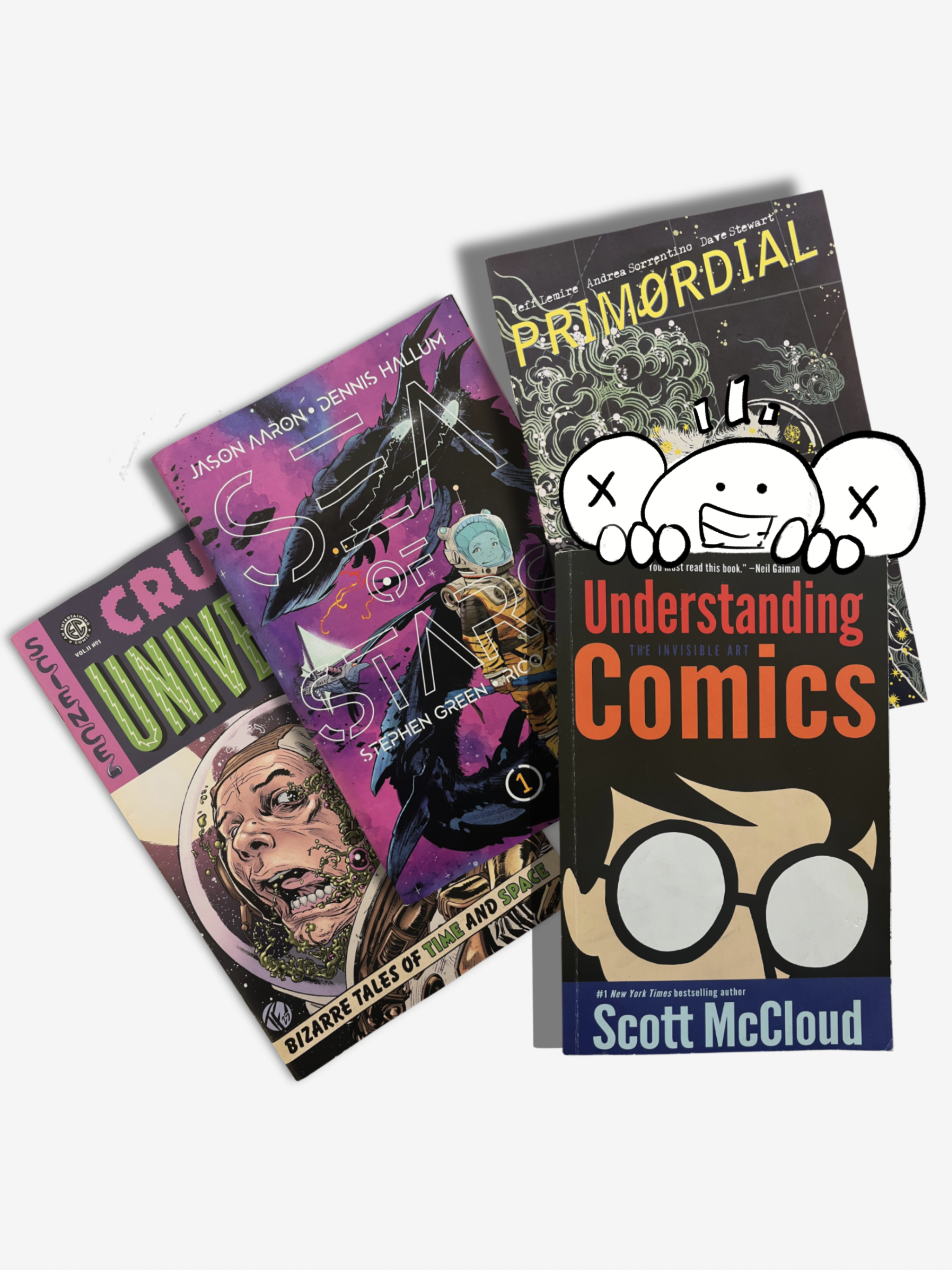 Four comic books stacked on top of each other with colorful covers featuring various illustrations and titles.