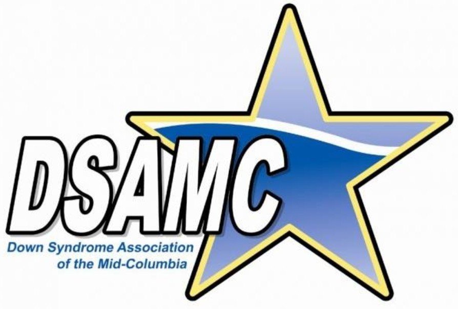Logo for Down Syndrome Association of the Mid-Columbia featuring a large blue star with a yellow outline and the acronym DSAMC, with the full organization name written below.
