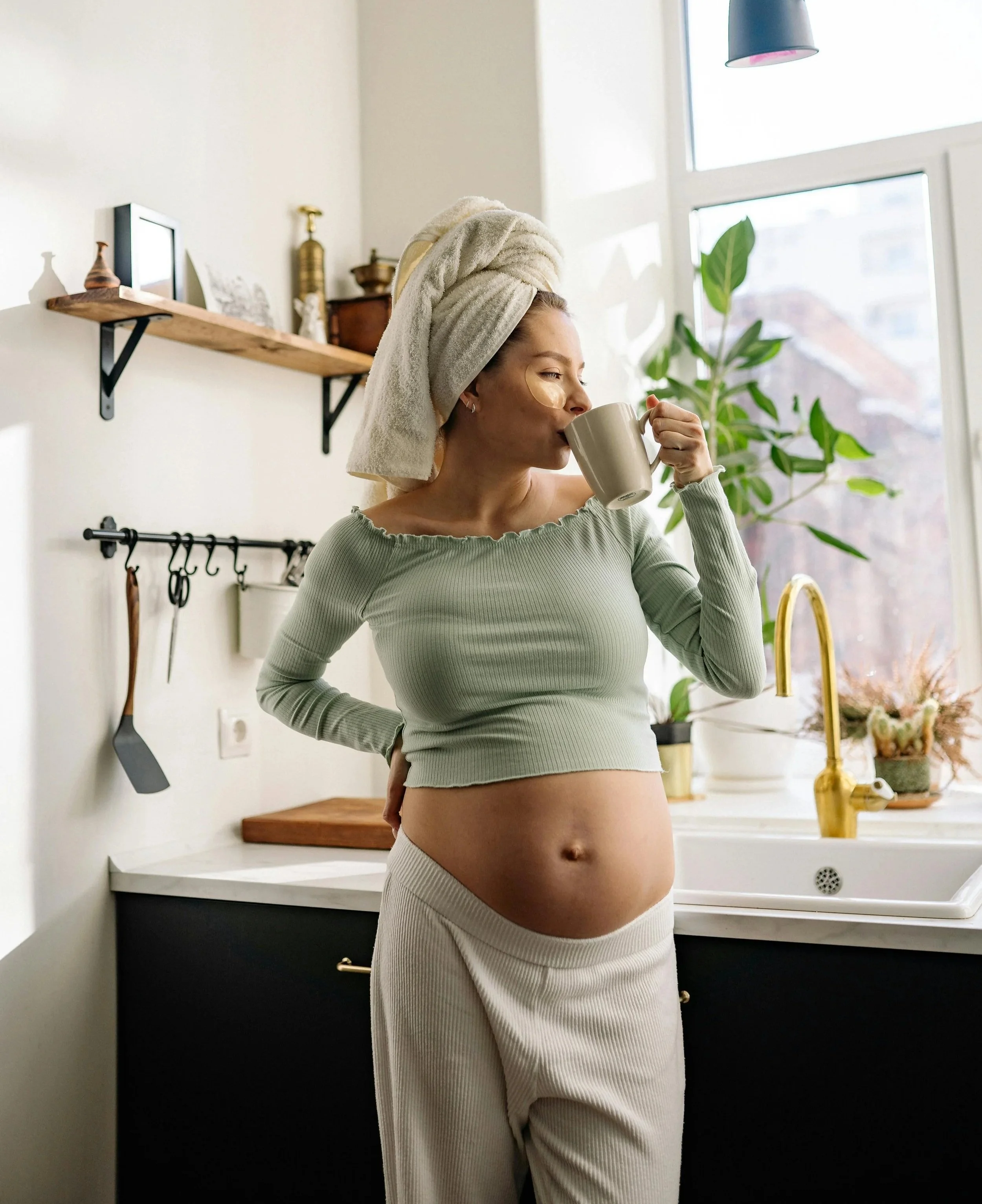 Pregnant woman with self care because Bloom Her Path provides you with professional and product resources to guide you through pregnancy