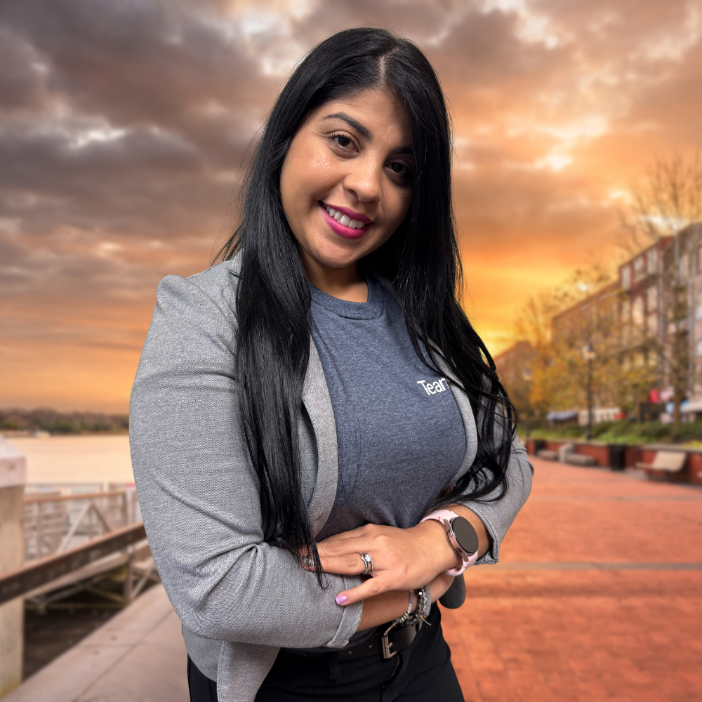 A black background with an orange and brown 'X' symbol in the center.