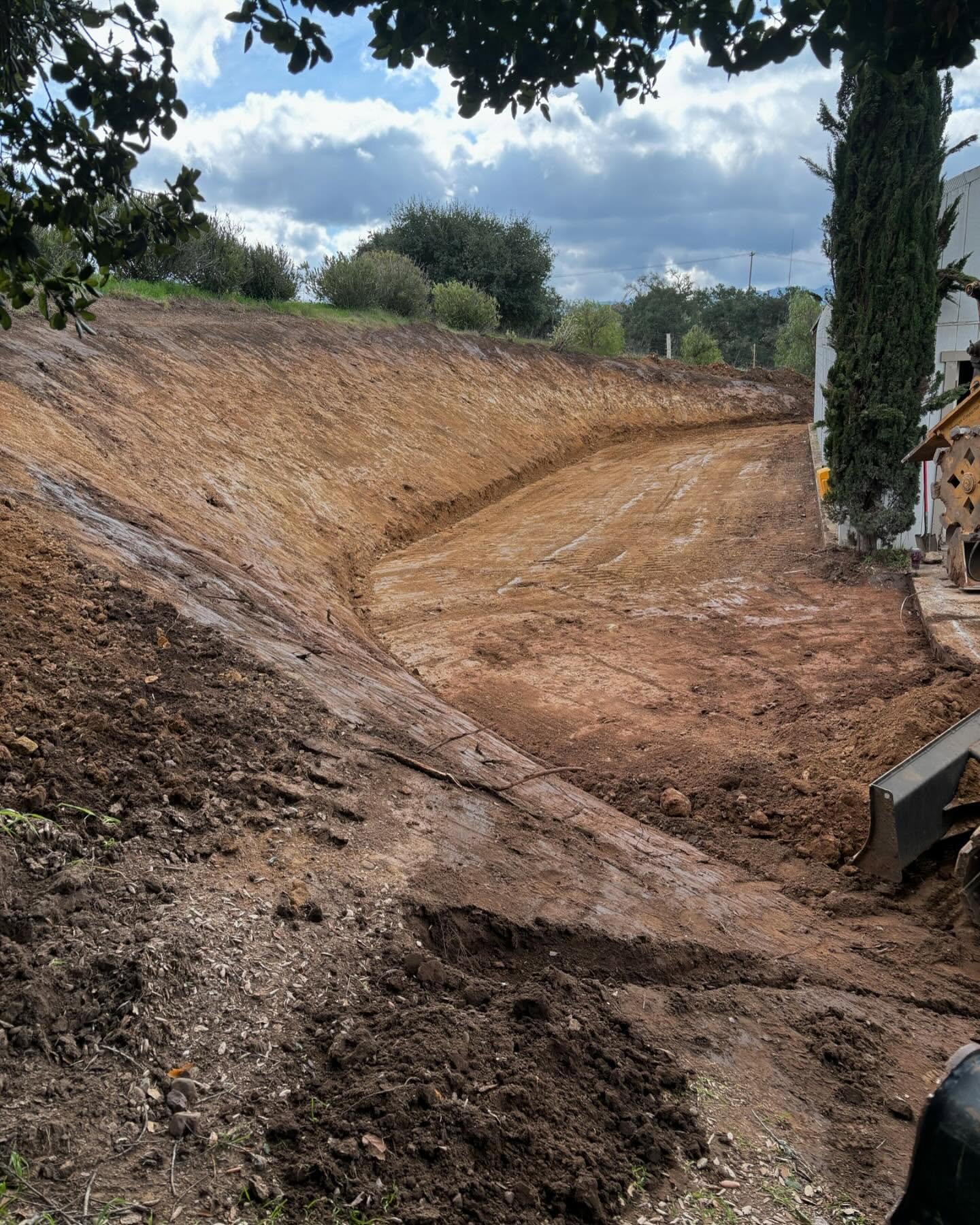 Hillside cut with a parking pad 2024