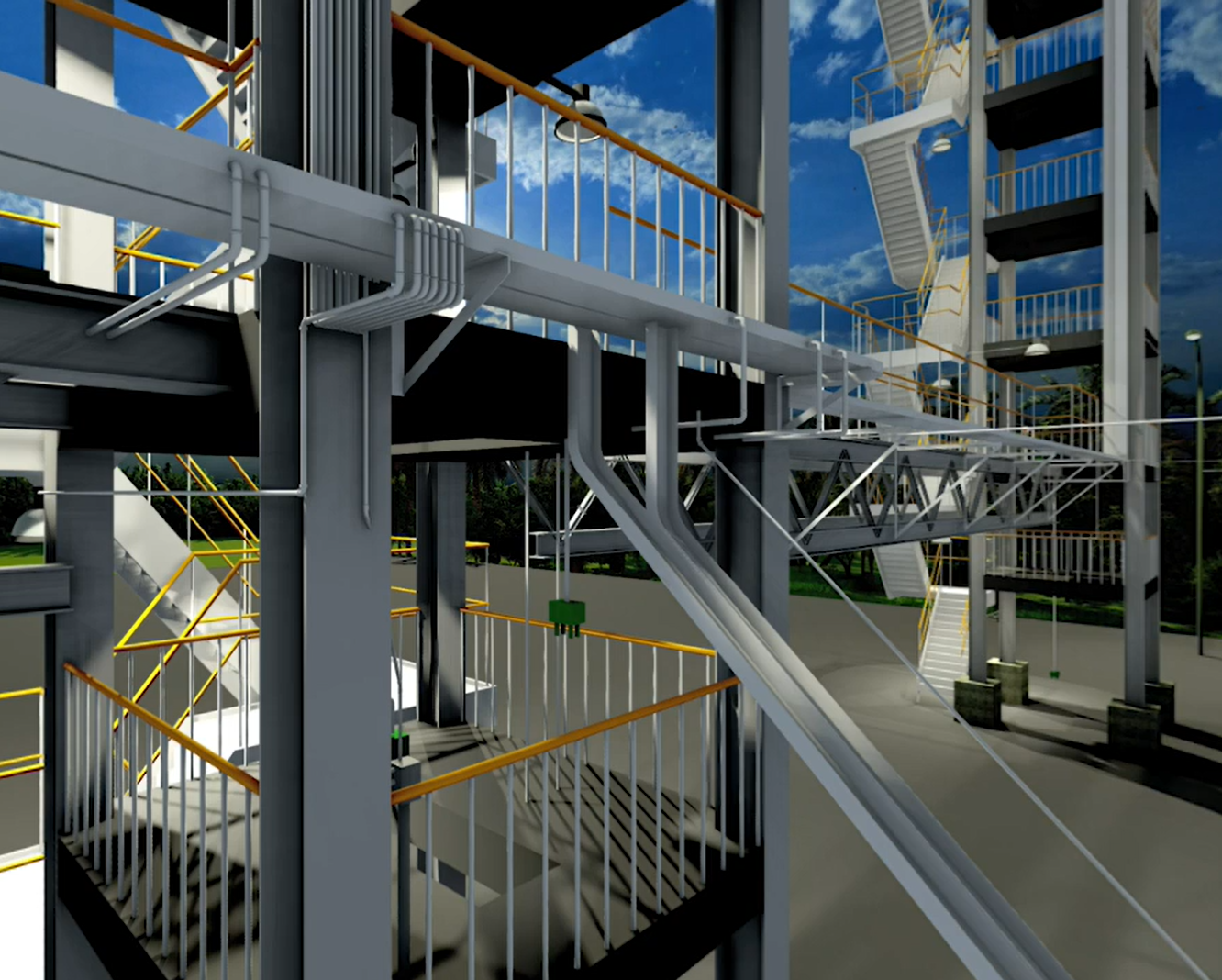 Industrial facility with metal structures, pipes, and staircases under a blue sky with clouds.