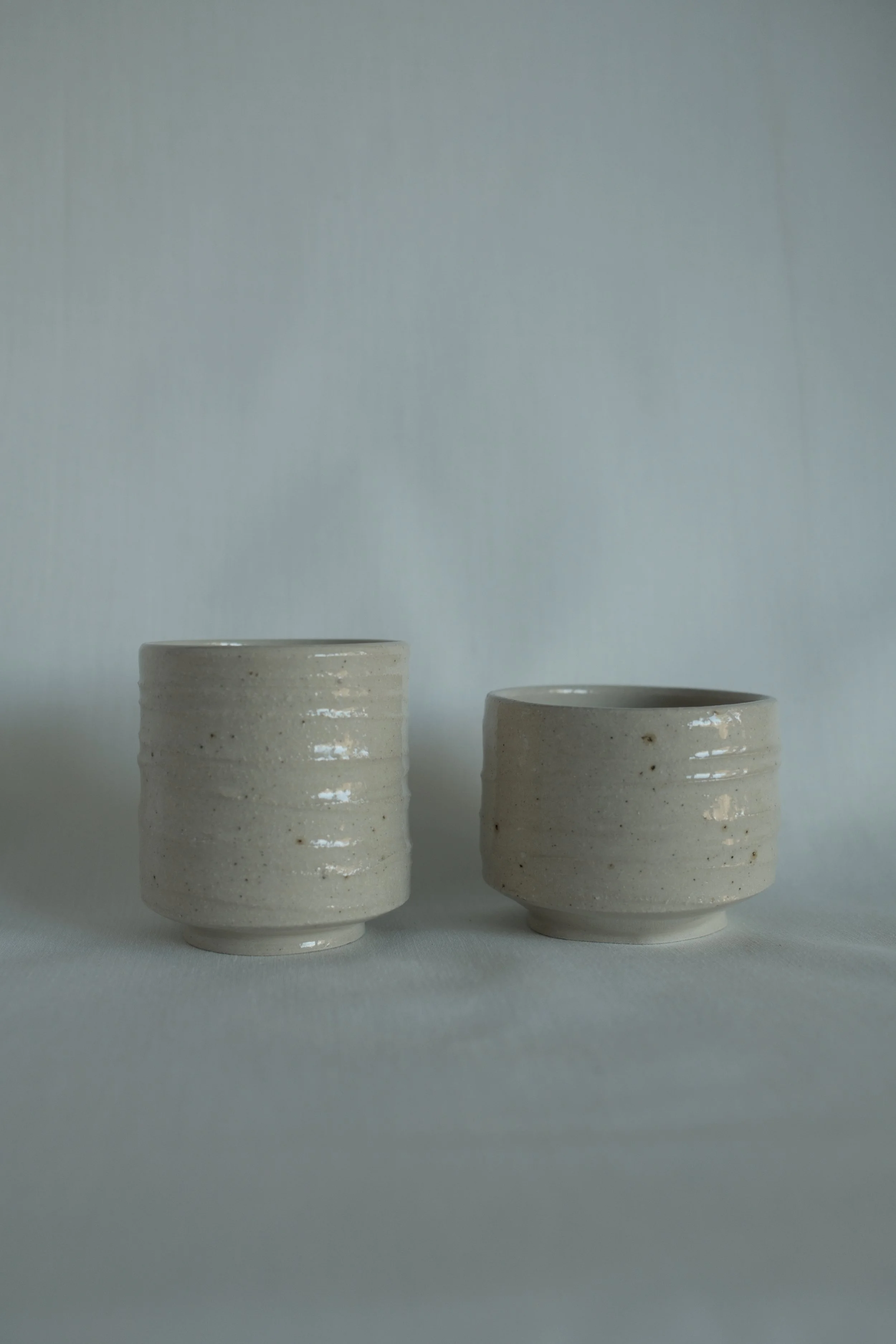 SET OF TWO ARTISAN CUPS