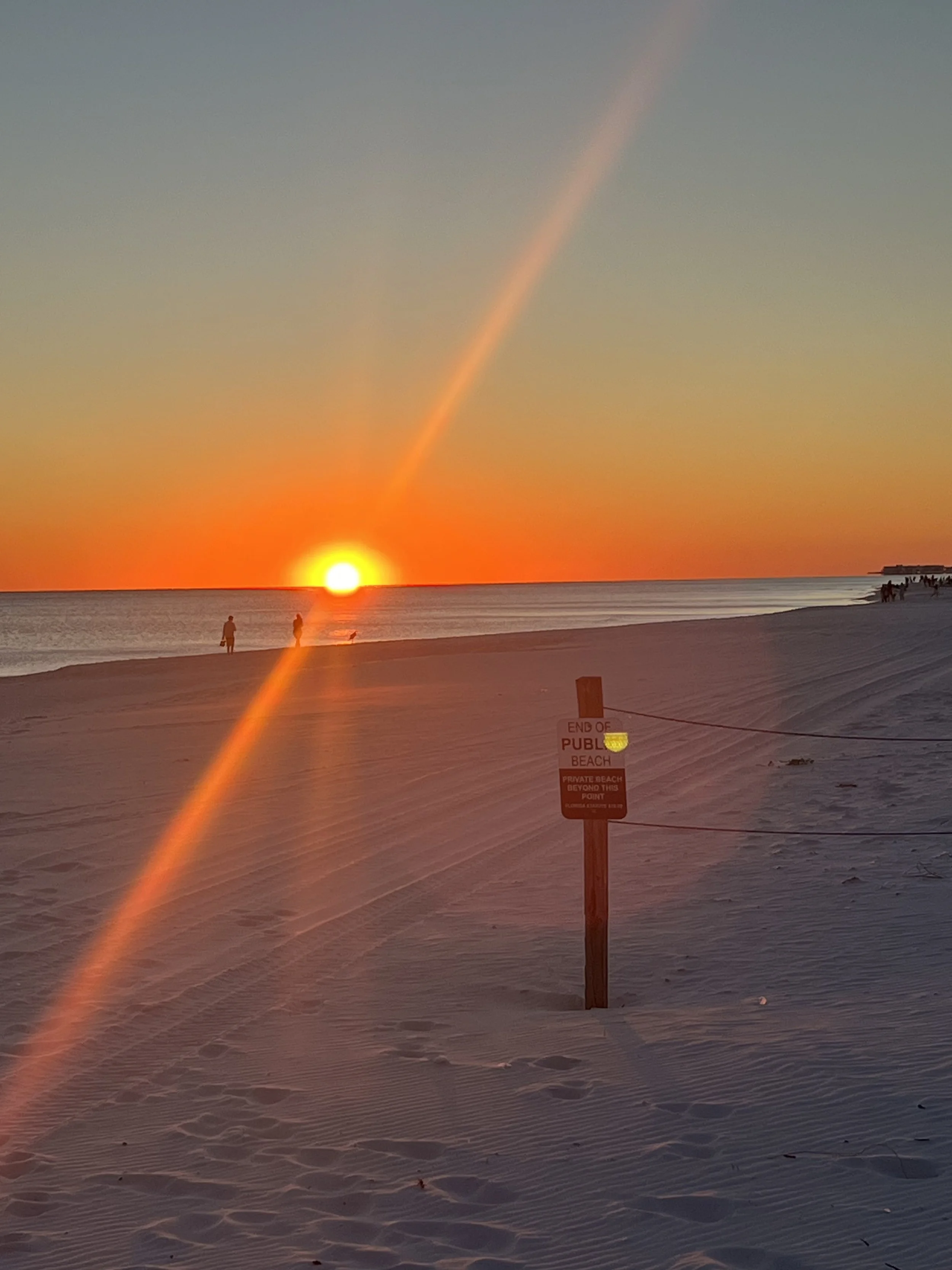Sunset over a Diamonds in the Sand in Destin FL