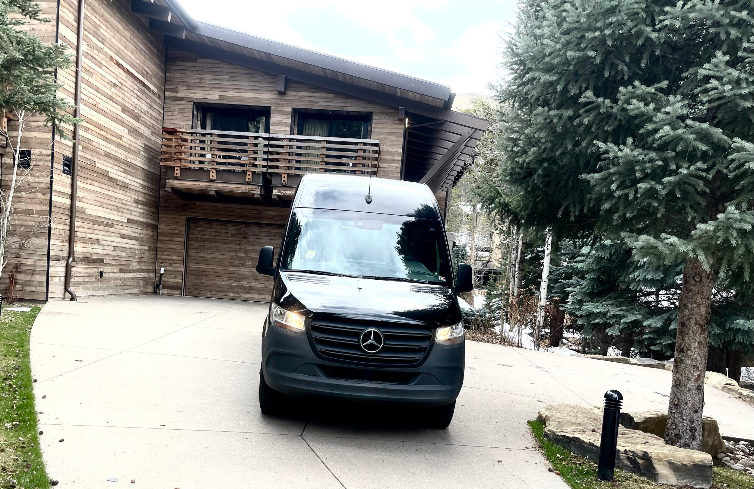 IZKAM Mercedes passenger van providing private transportation at a Colorado mountain residence