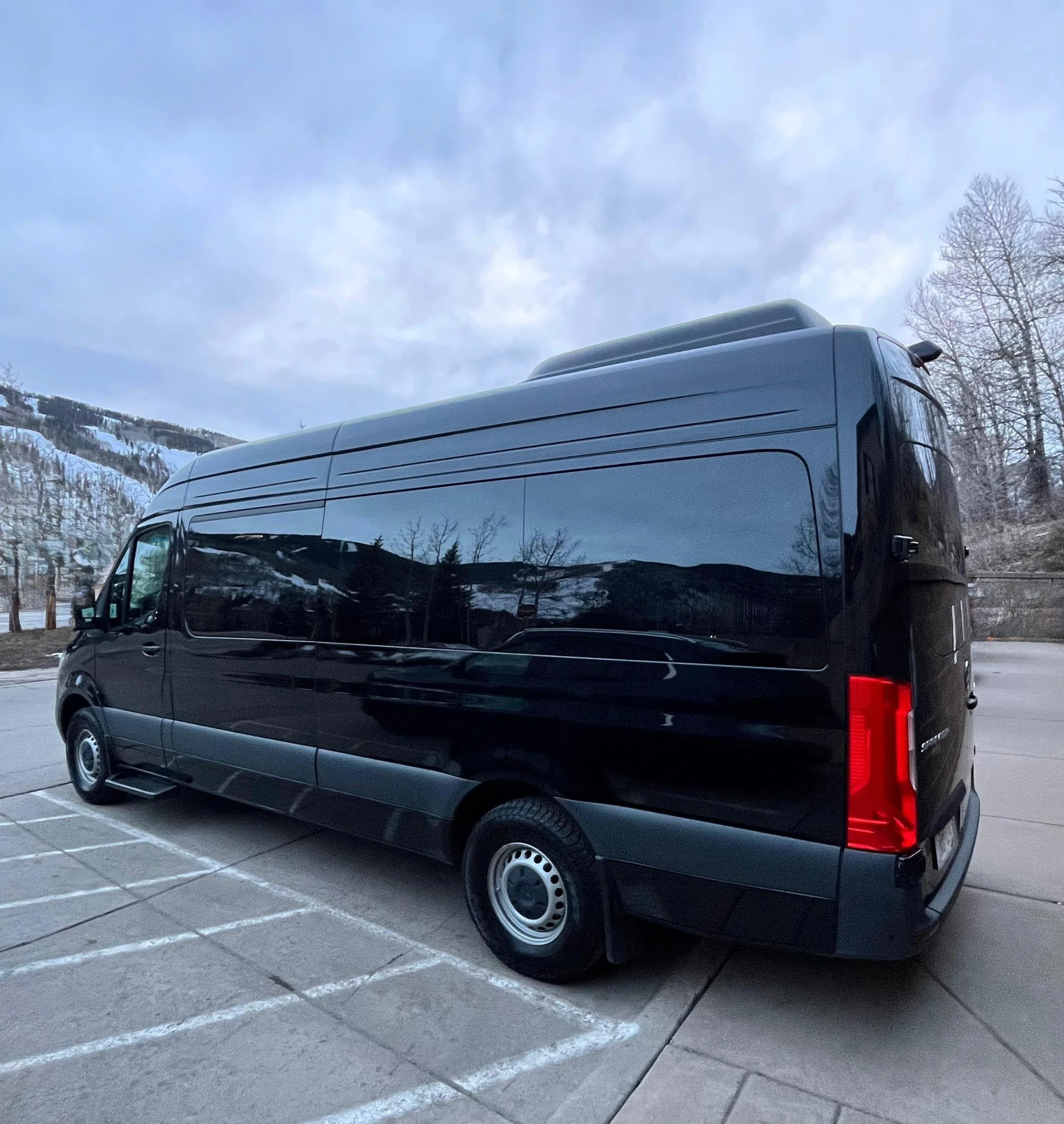 Black luxury passenger van for private group transportation in Vail, Colorado