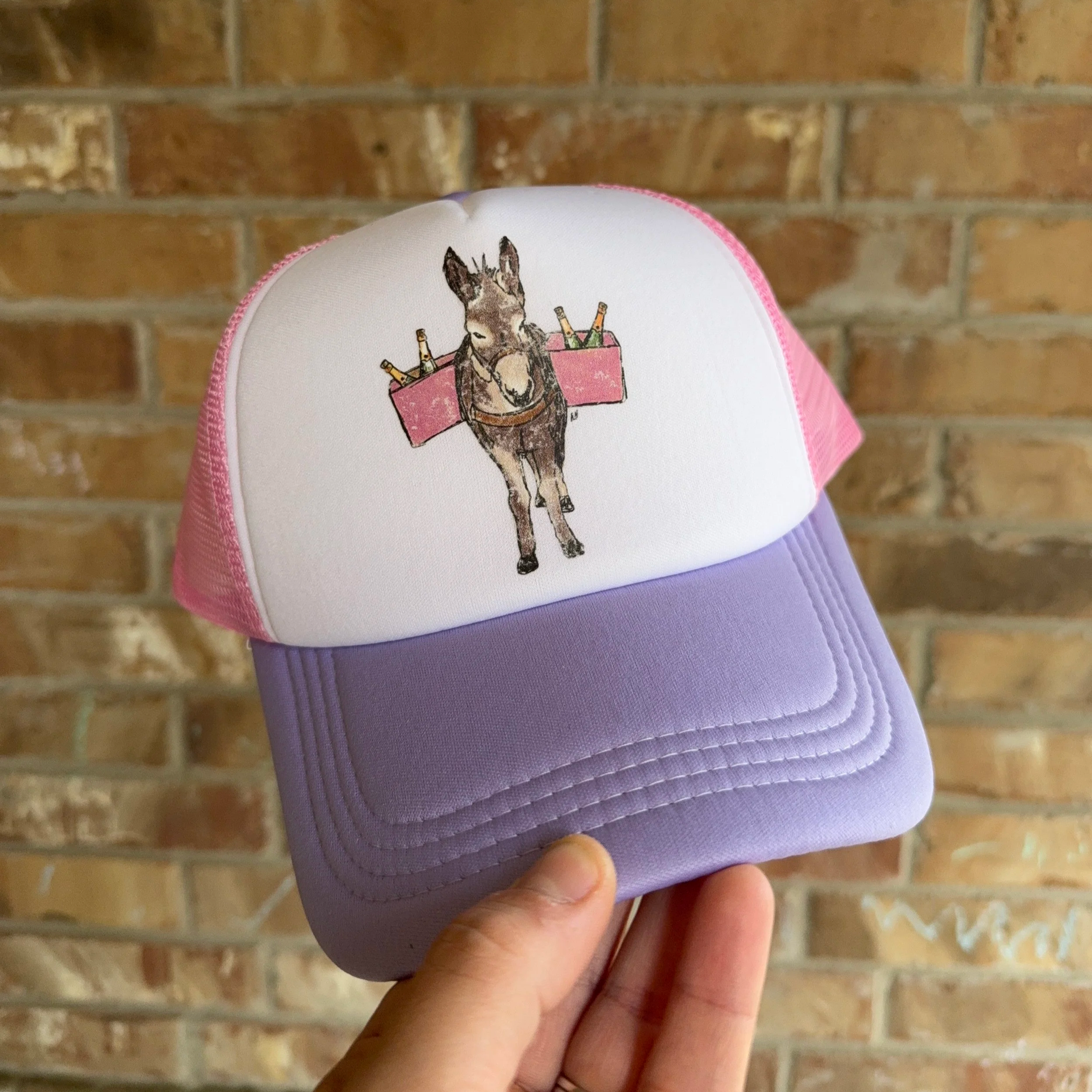 Donkey Champagne Run Trucker Hat