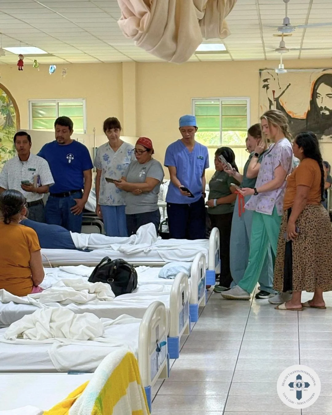 In the middle of the recovery room, something beautiful often happens. Our volunteers gather together and begin singing hymns&mdash;voices rising softly in the space where patients are resting and healing.

Patients pause to listen. Some pull out the