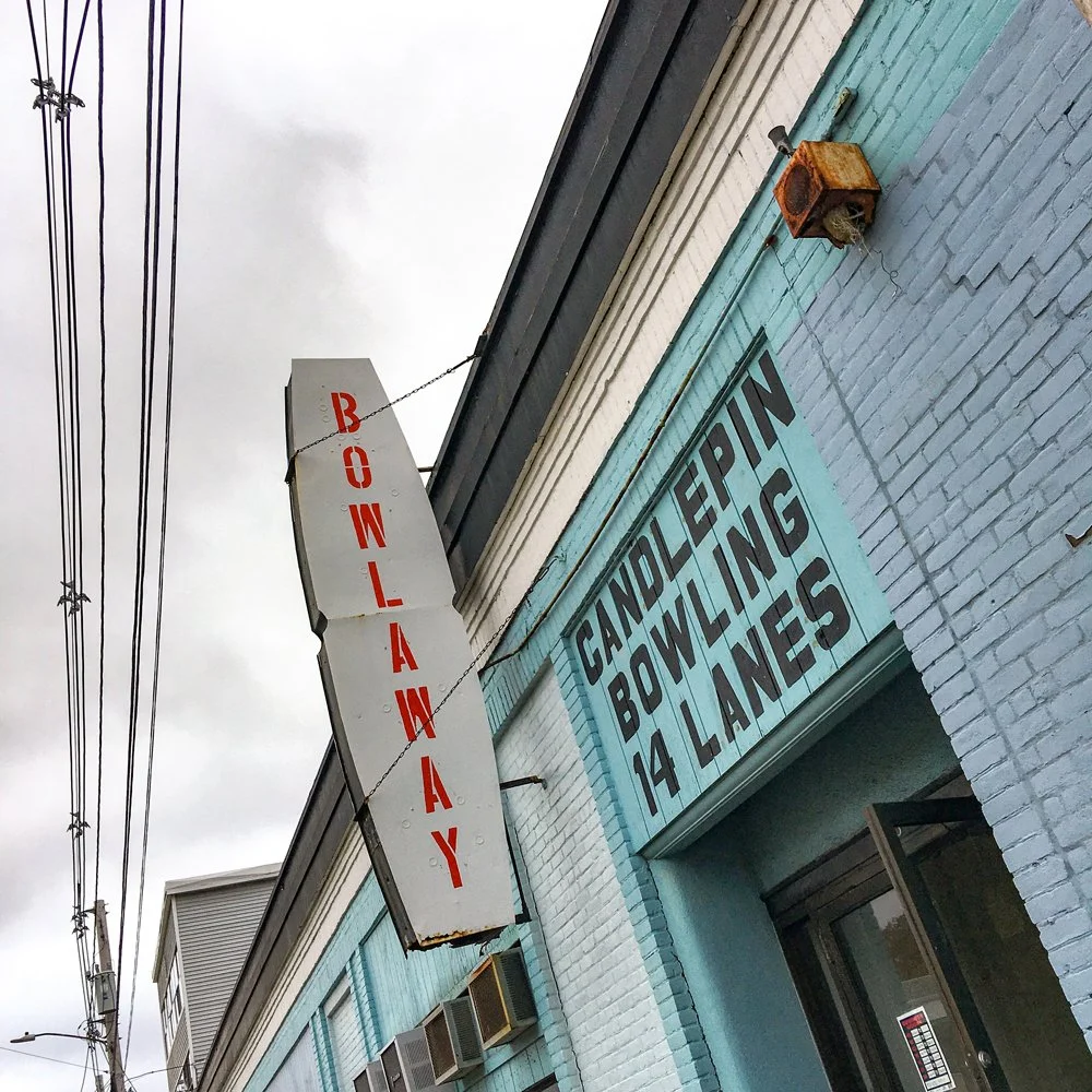 "Bowlaway"
Brian's Bowlaway was an old-school candlepin house in central Massachusetts. The spot was built in the 1930s and beckoned bowlers with its vintage charm.  The wooden ball returns were painted to match the pastel Brunswick masking units at 