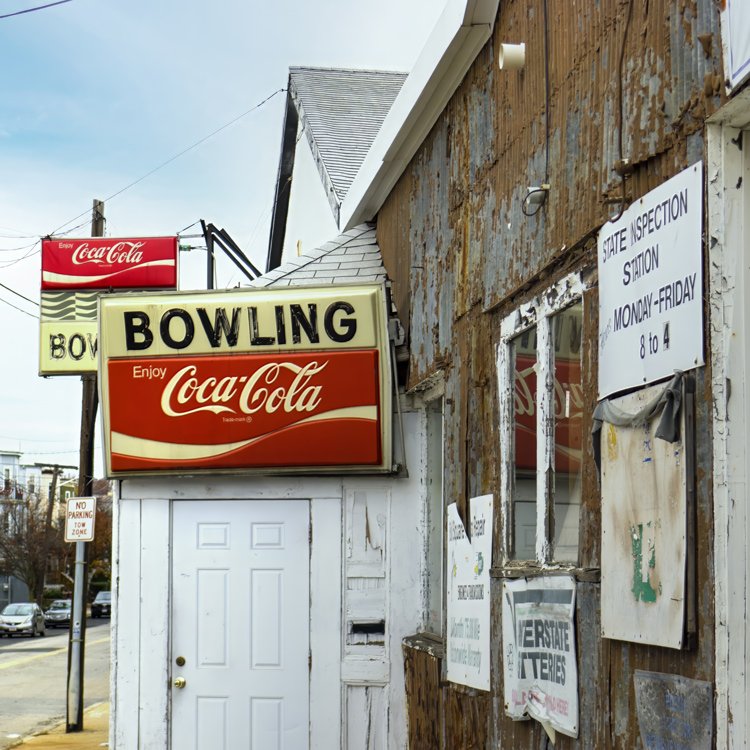 "Ball Square"
No, the balls aren't square! Ball Square is a neighborhood in Somerville, Massachusetts, and Ball Square Bowling was a candlepin house that closed in 2017 after 50 years in business when the state took the property for a light-rail expa