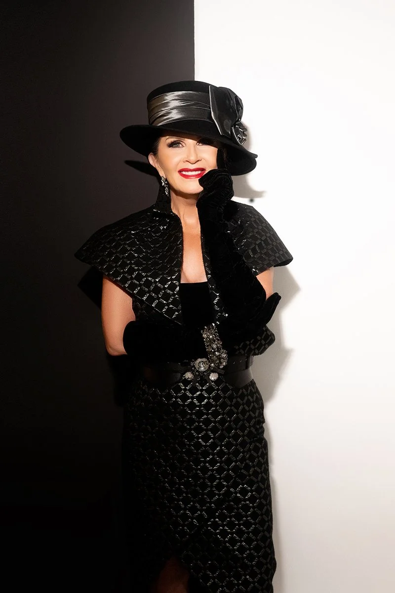 Female business owner posed with flattering studio light during a branding photoshoot.
