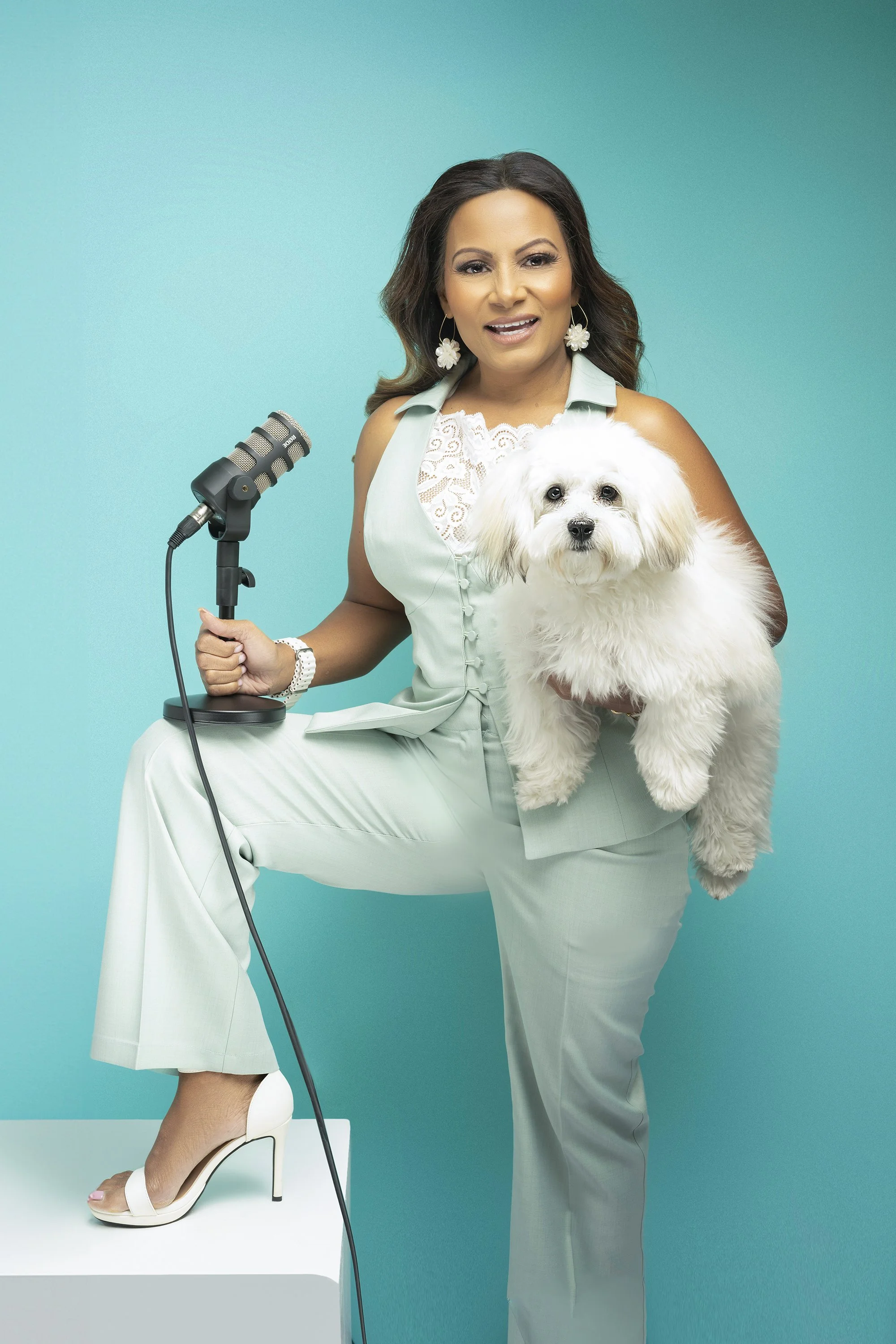Woman entrepreneur at a studio branding shoot creating months of professional content.