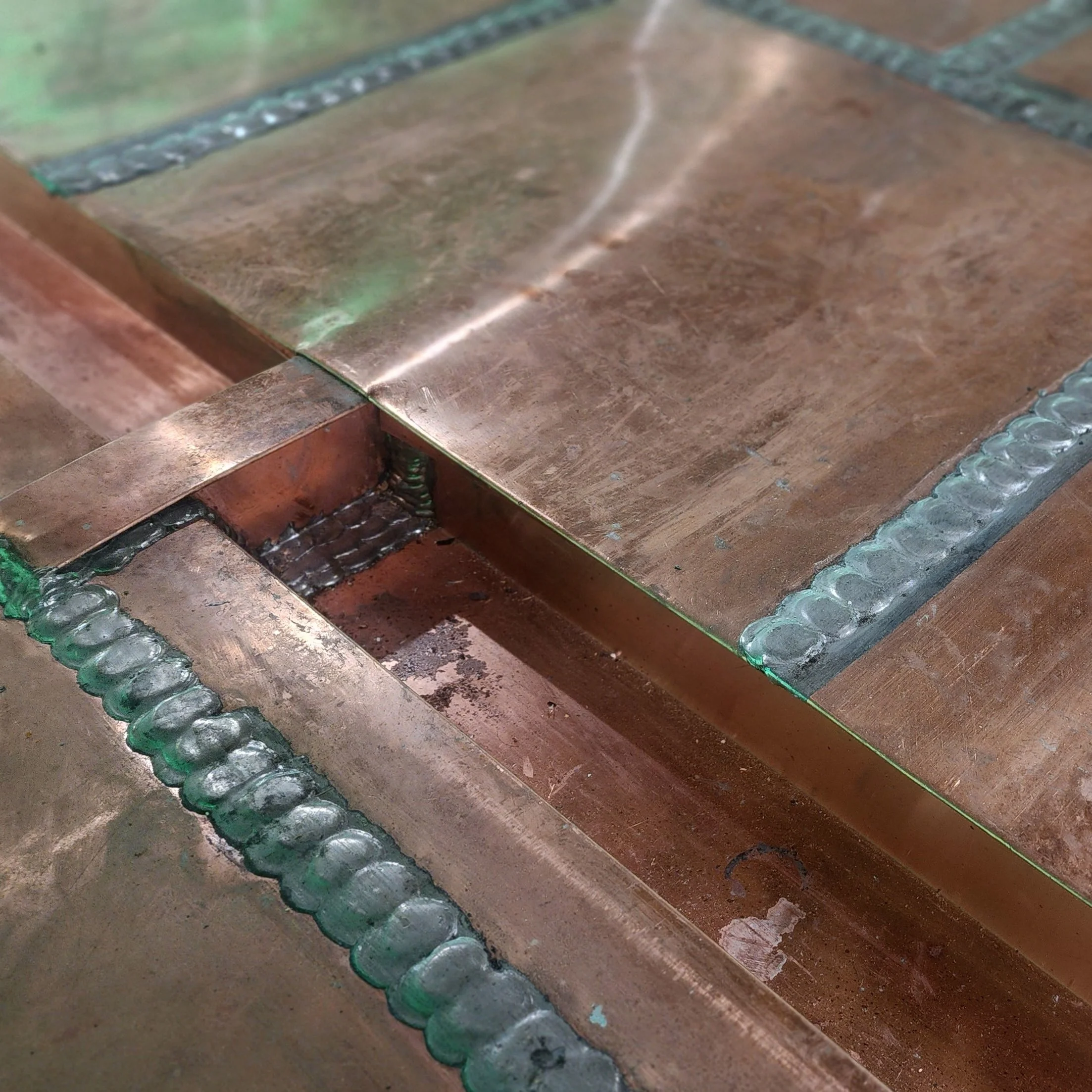 Copper guttering by Slate and Copper Services in Portsmouth, Rhode Island and Easton, Connecticut, serving Fairfield County, Providence, coastal RI, and South Coast, MA.