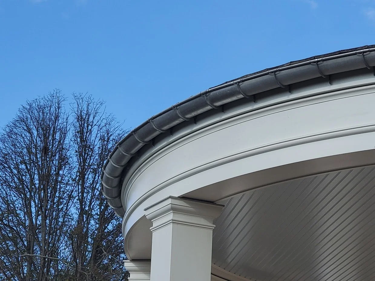 Copper guttering by Slate and Copper Services in Portsmouth, Rhode Island and Easton, Connecticut, serving Fairfield County, Providence, coastal RI, and South Coast, MA.